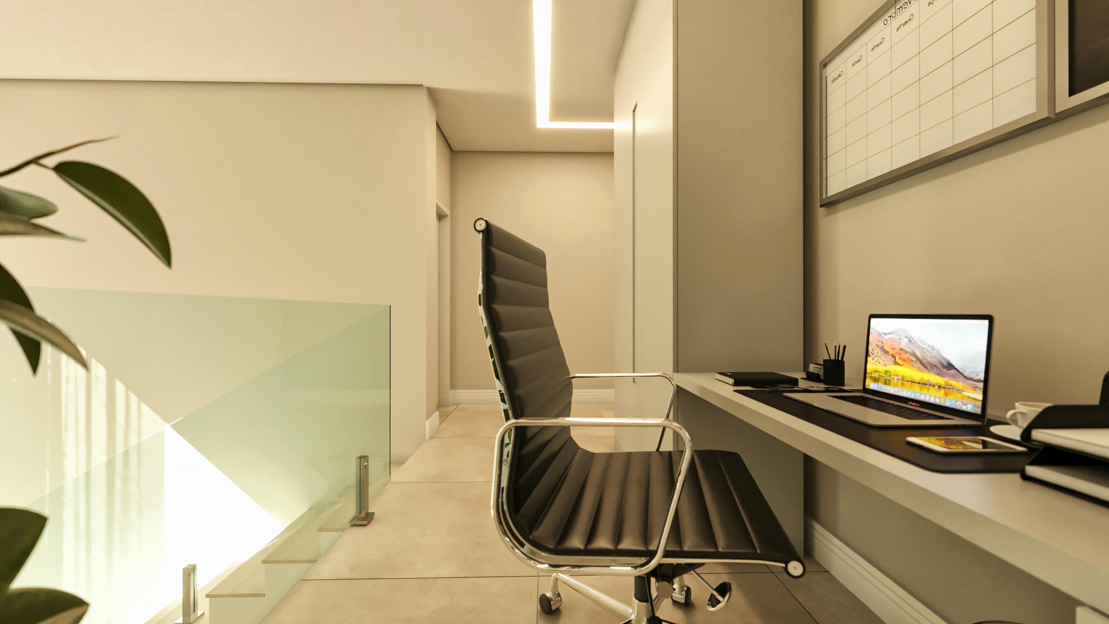 Detail of the workstation in the home office of the modern two-story house, showing a laptop, office chair, and view of the upper hallway, with a glass railing in prominence.