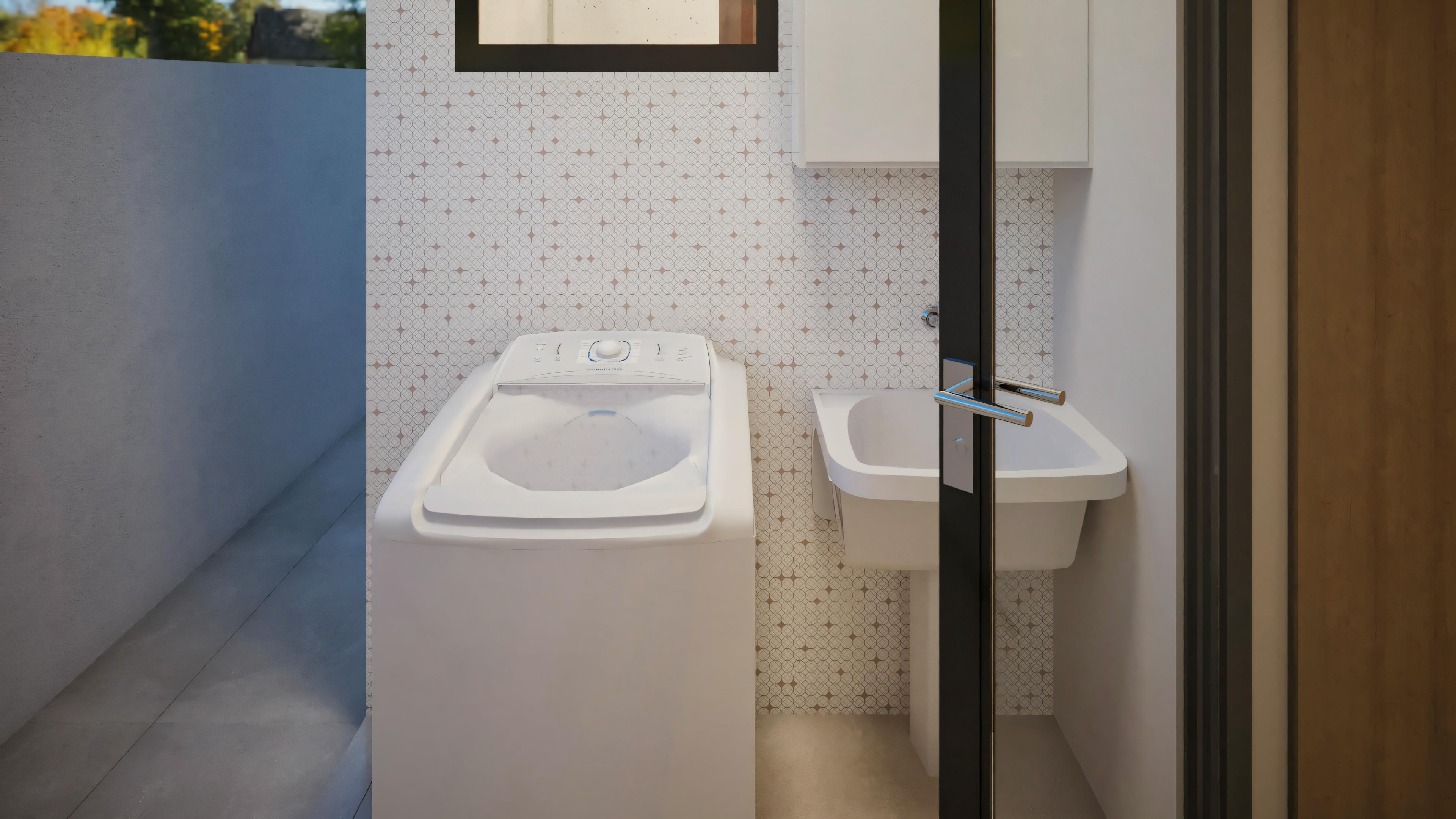 Laundry room with a washing machine and dryer, tiled floor, and a patterned wall design.