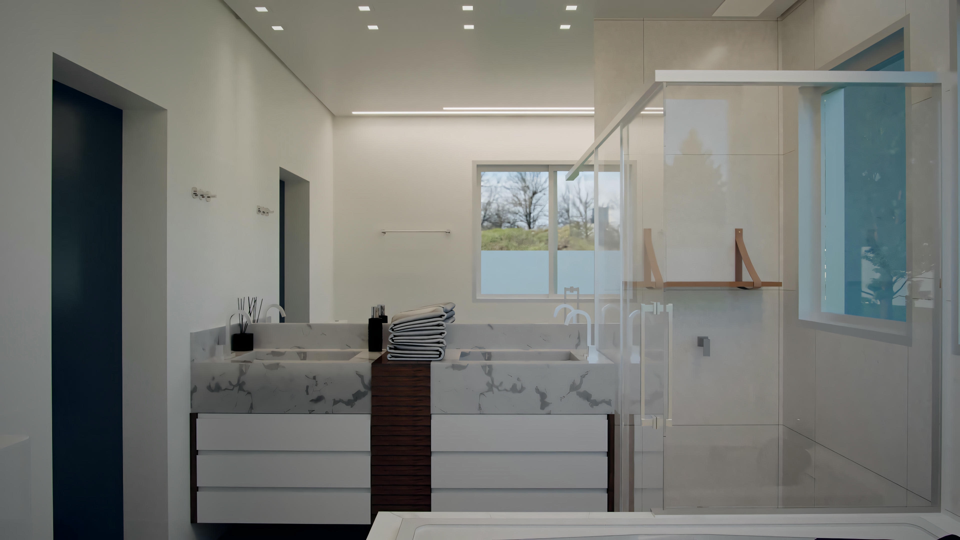 A modern bathroom with a clear glass shower enclosure on the right, a double vanity with a central countertop, and a large mirror above.