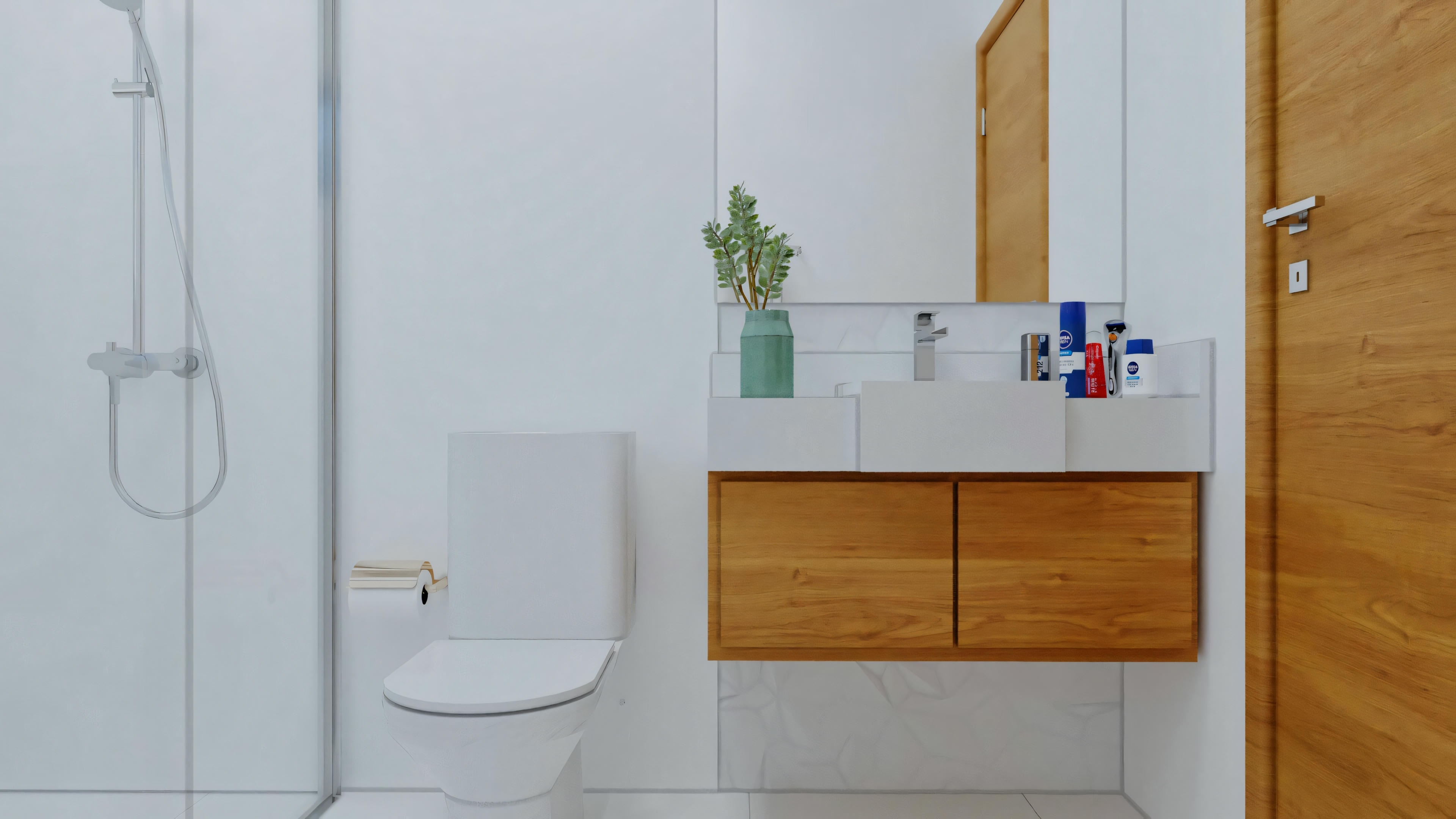 A bathroom with white walls, a toilet on the left, and a wooden cabinet with a white countertop in the center.