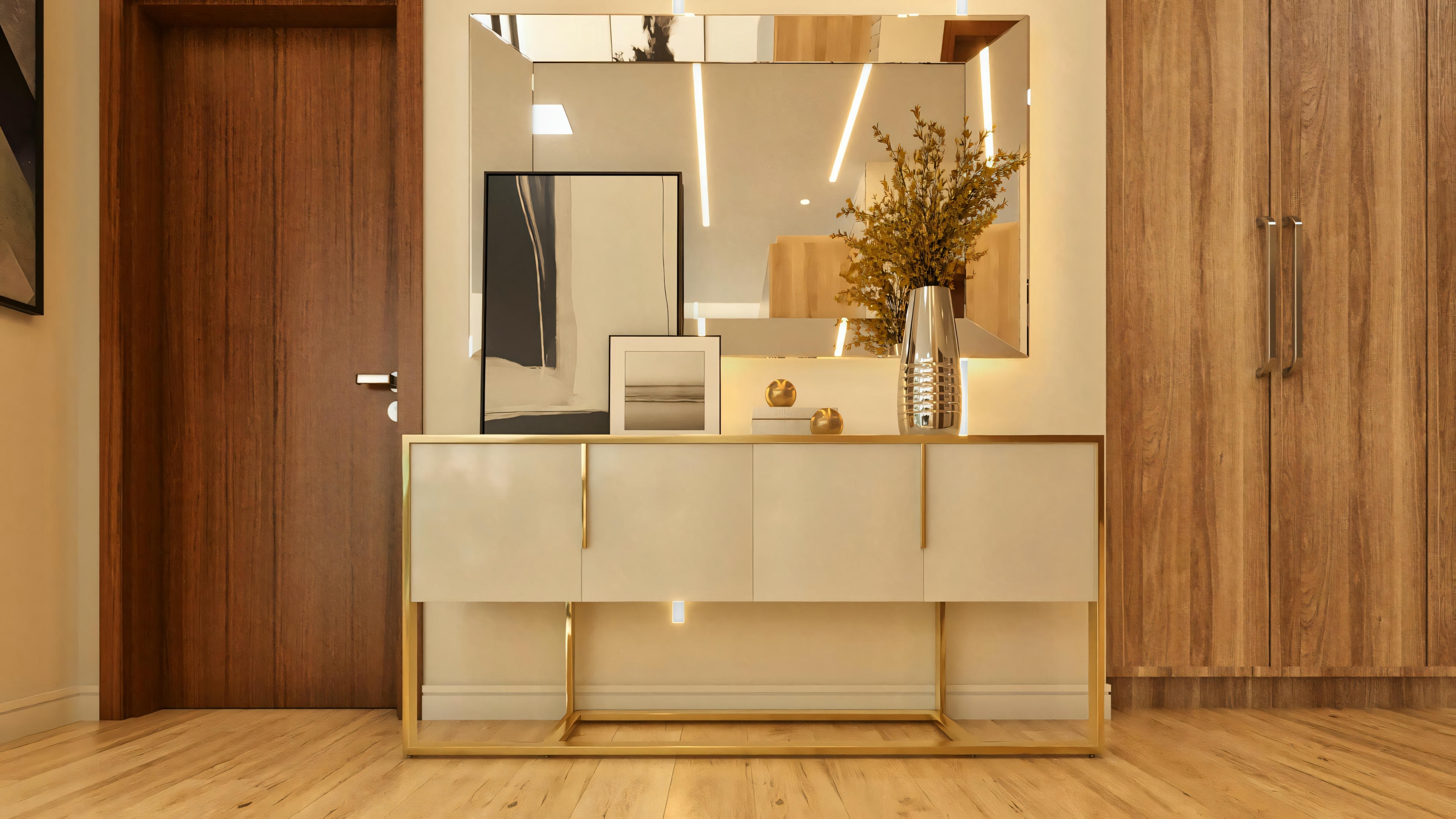 Recibidor moderno beige con base metálica dorada en el hall de entrada/corredor, complementado por espejo con iluminación LED y armario empotrado en madera, en proyecto de casa.