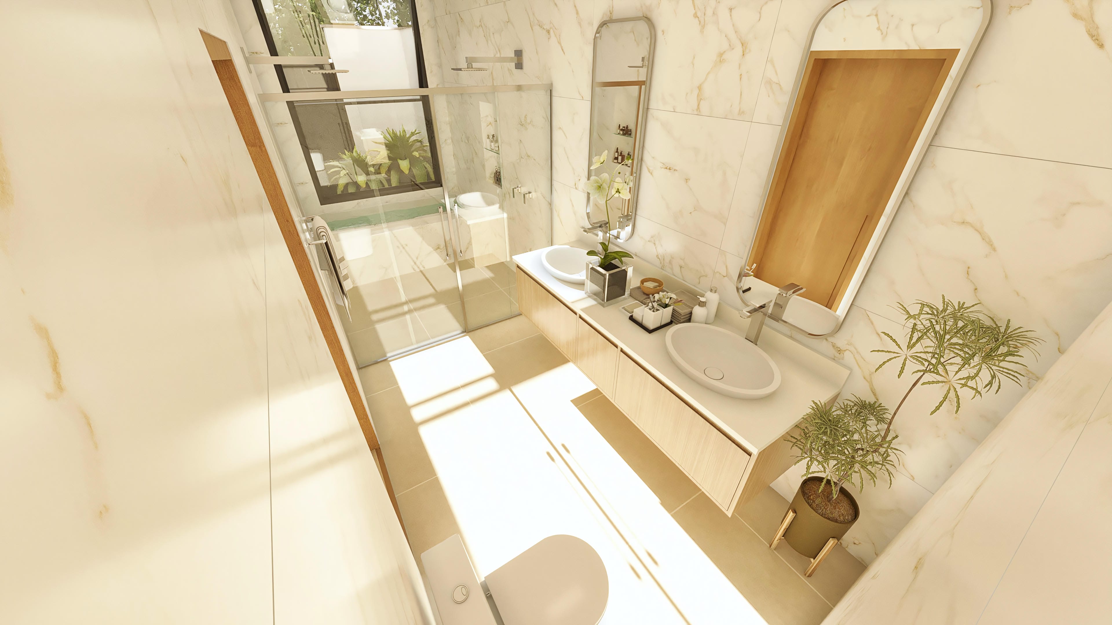 Baño moderno con revestimiento en mármol, encimera doble con lavabos de sobreponer y espejo grande y ovalado. Incluye box con ducha y detalles en madera.