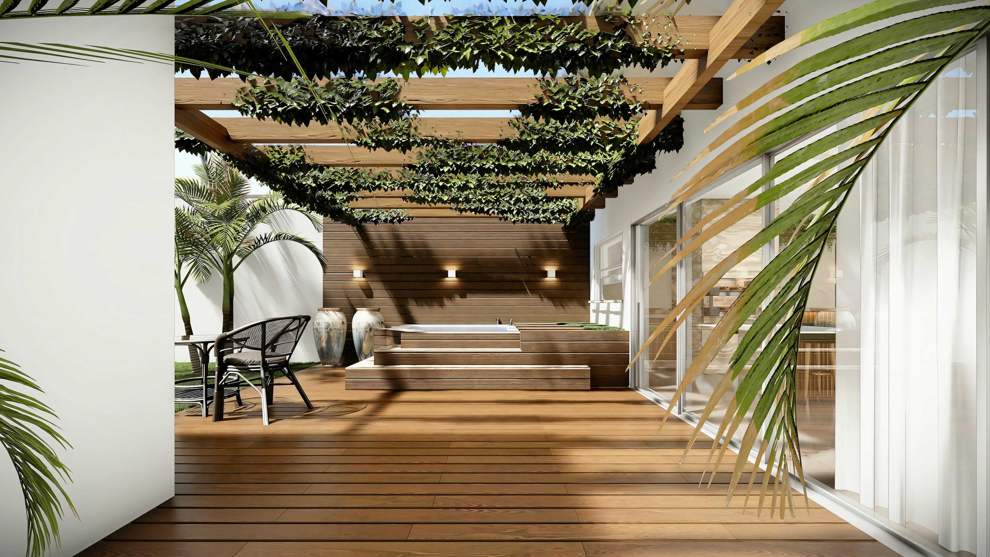 An internal patio with a wooden floor, plenty of greenery, and seating areas.
