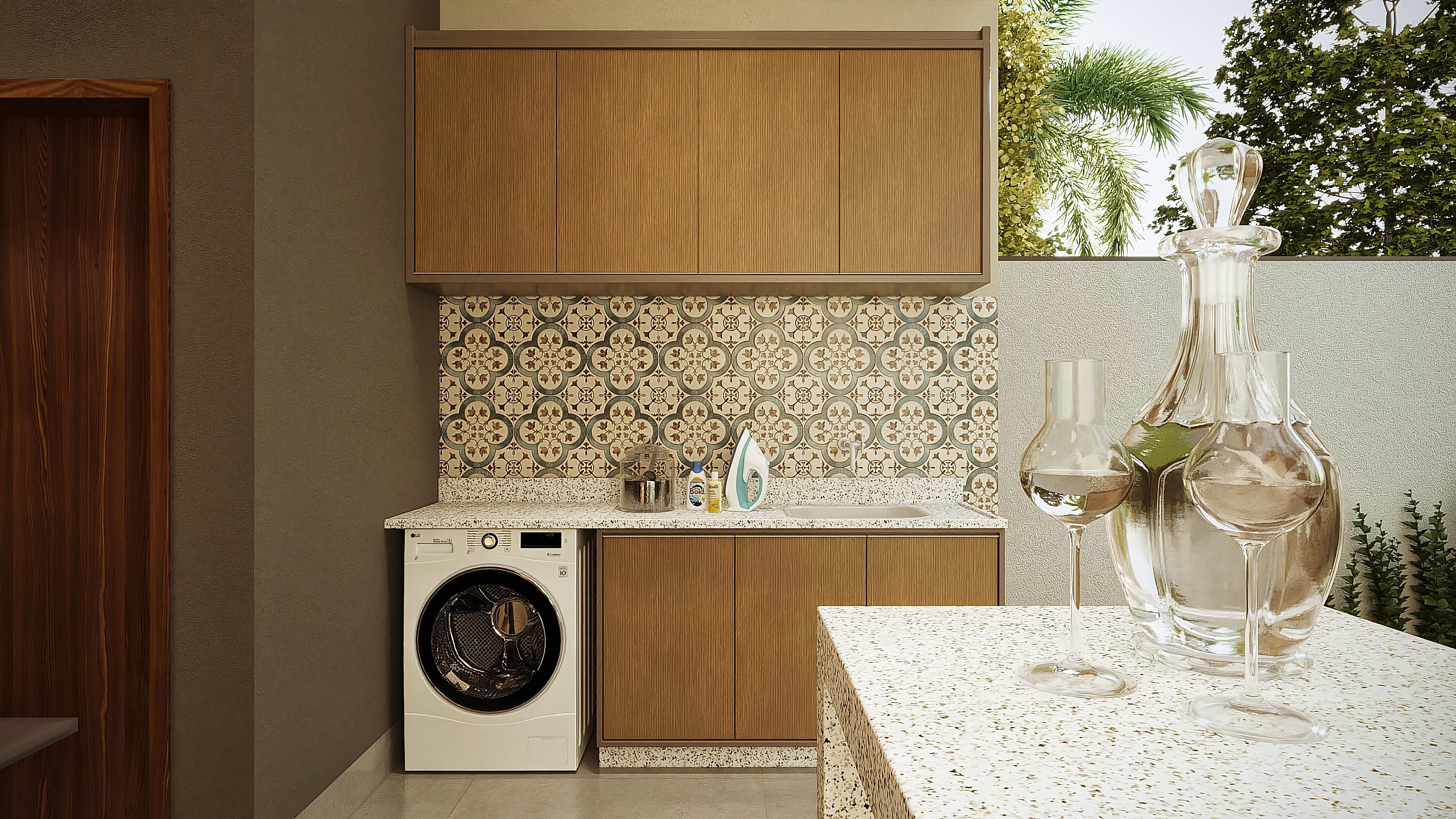 Lavadero compacto con diseño moderno, presentando armarios de madera listonada, encimera de terrazo y revestimiento de azulejos con estampado geométrico.