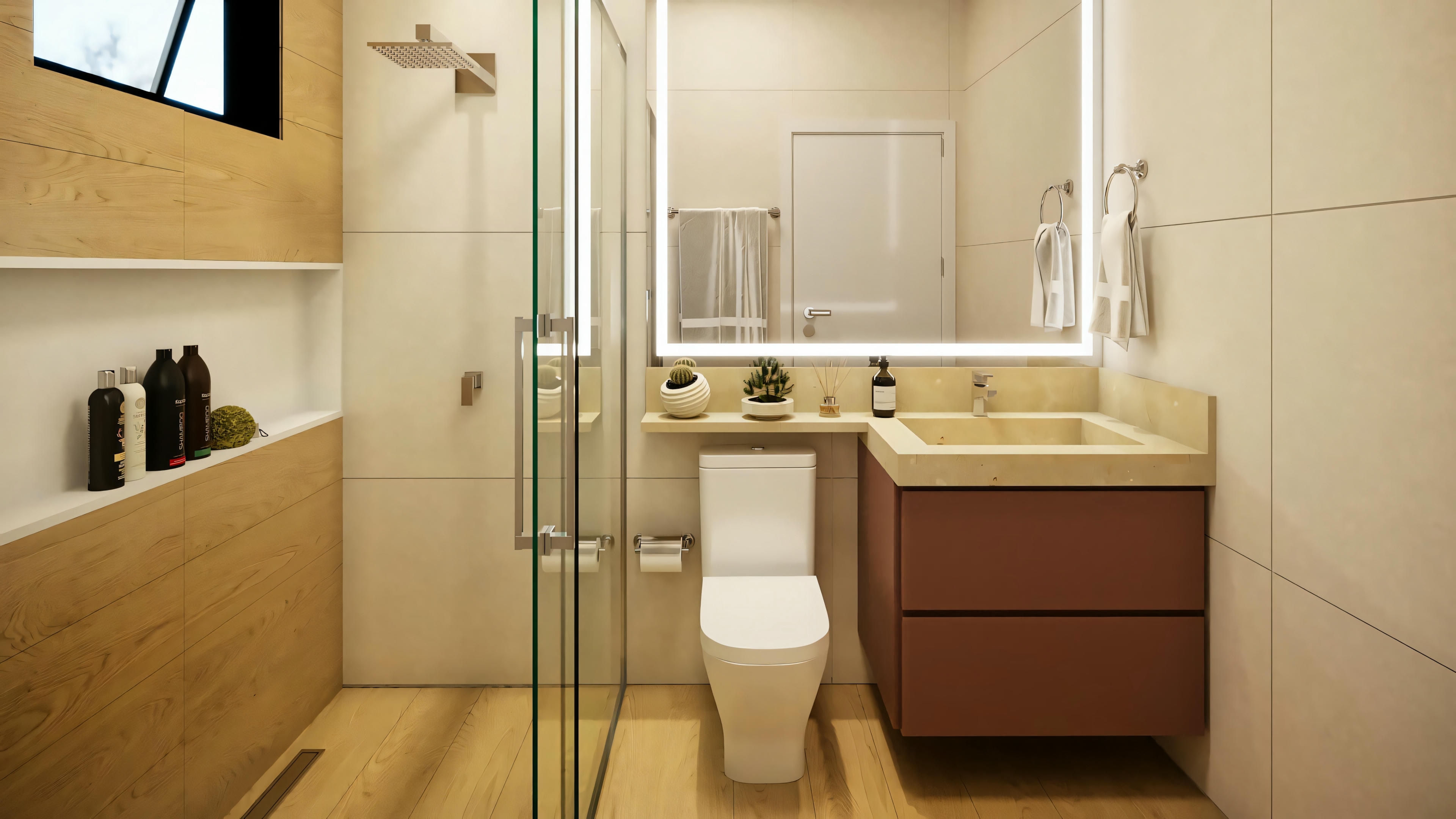 Un baño com ducha de cristal a la derecha, inodoro en el centro y lavabo com encimera a la izquierda.