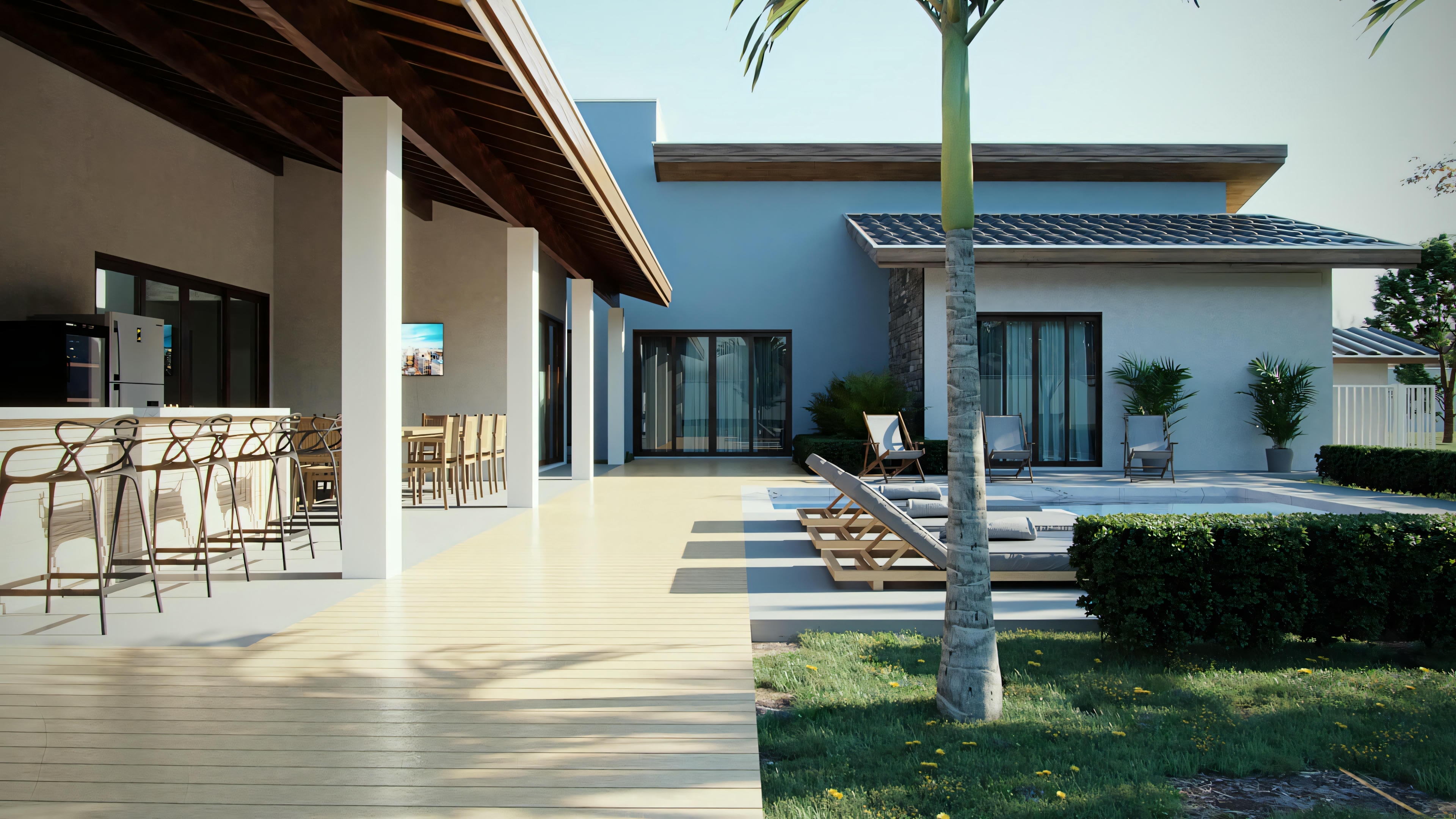 Vista exterior de una casa con arquitectura contemporánea, líneas limpias, grandes ventanas y área de patio abierta.