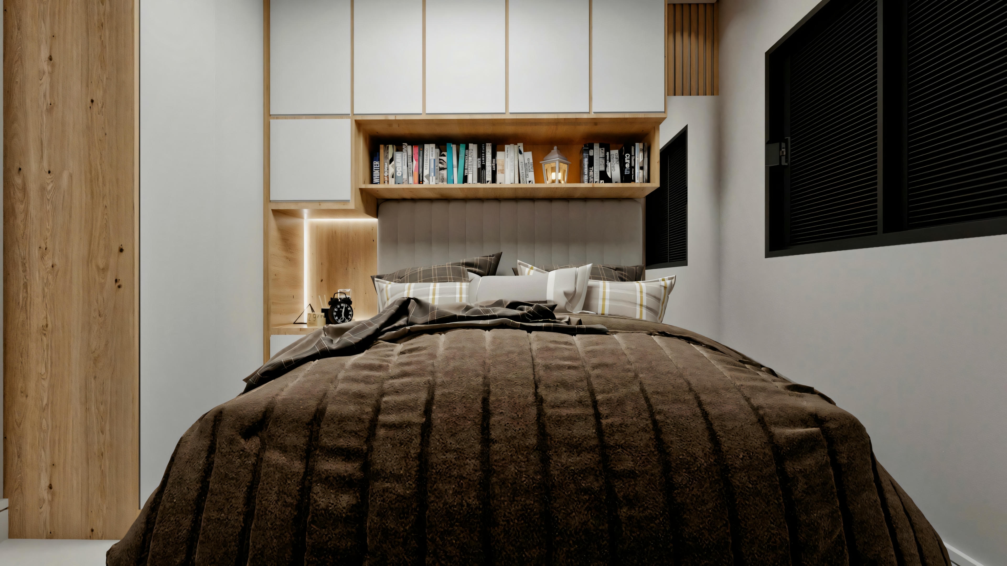 Modern bedroom with a large bed, upholstered headboard, and bedside tables.