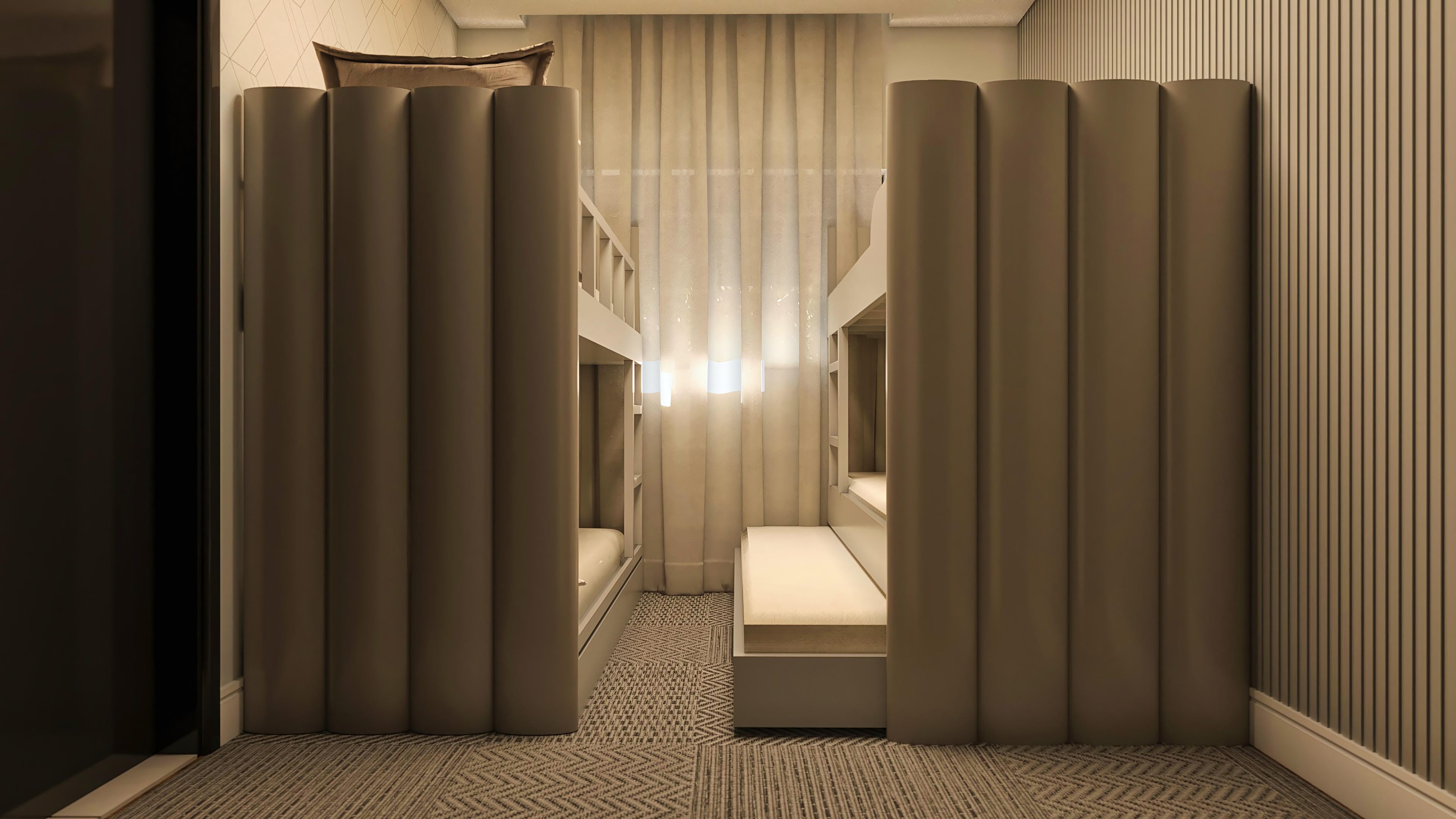 Detalhe de um quarto infantil moderno com beliches embutidas em painéis estofados e cortinas translúcidas, ideal para um sobrado contemporâneo.