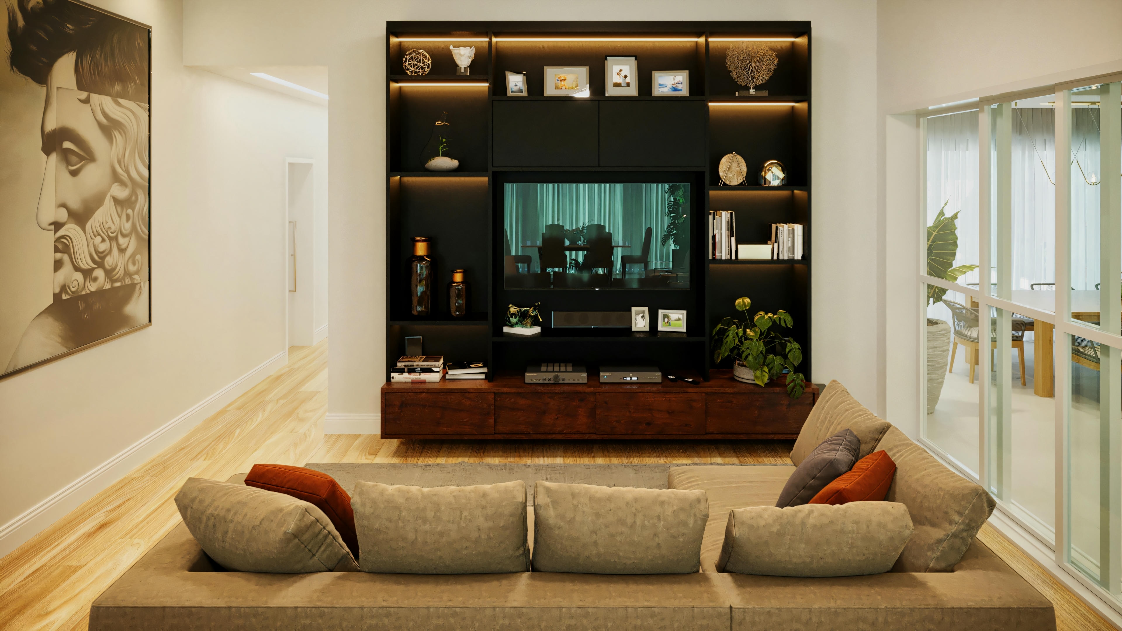 Sala de TV con sofá amplio, panel de TV oscuro con estanterías iluminadas y decoración moderna, en casa con 3 suites y zona gourmet.