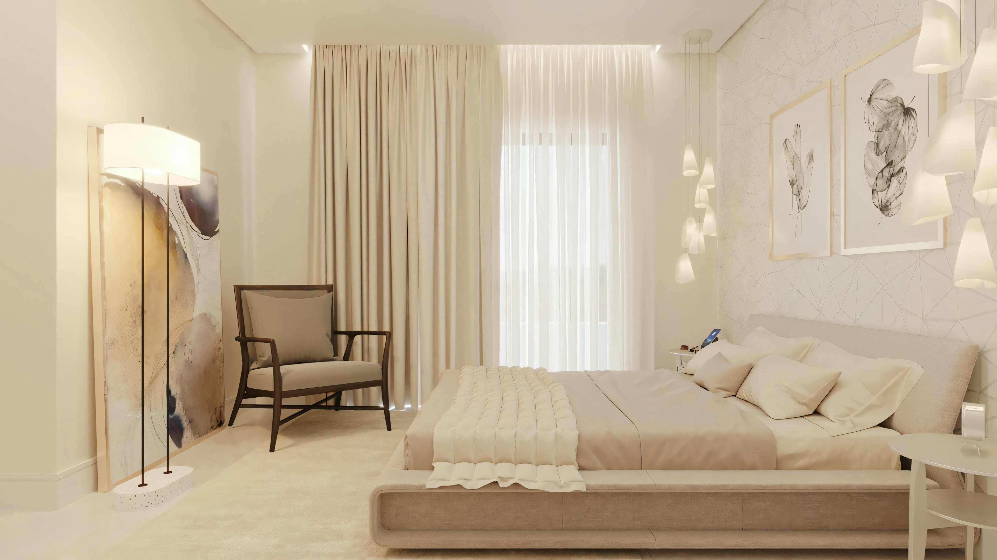A bedroom with a large bed, side tables, lamps, and a seating area at the foot of the bed.