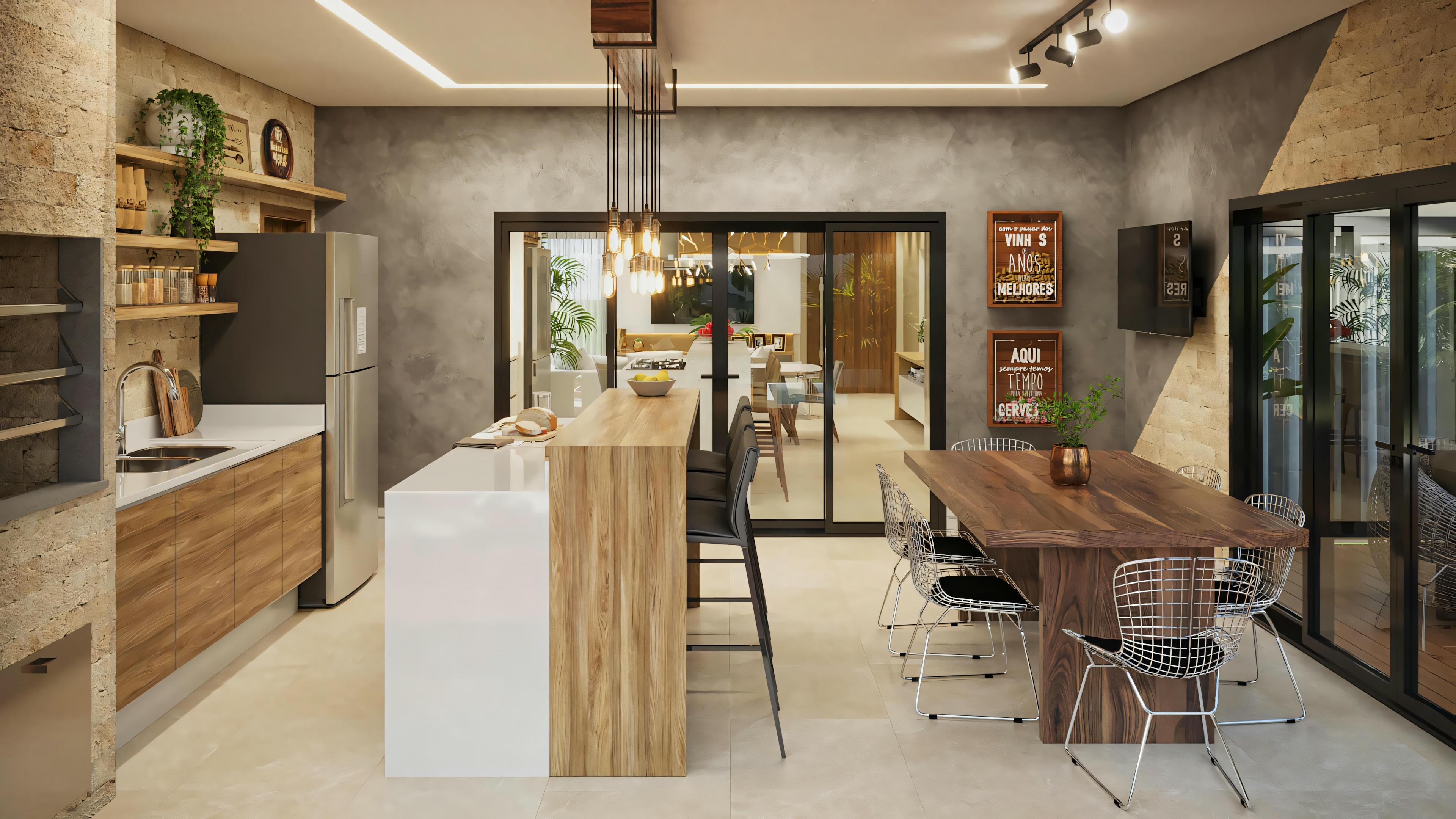 Vista general del área gourmet con cocina y sala de comedor integradas, parte del proyecto listo de casa de planta baja con 2 suites. El ambiente muestra la mesada de la cocina com fregadero, nevera, estanterías, isla con banquetas, colgantes de luz, mesa de comedor y acceso vidriado a otros ambientes.