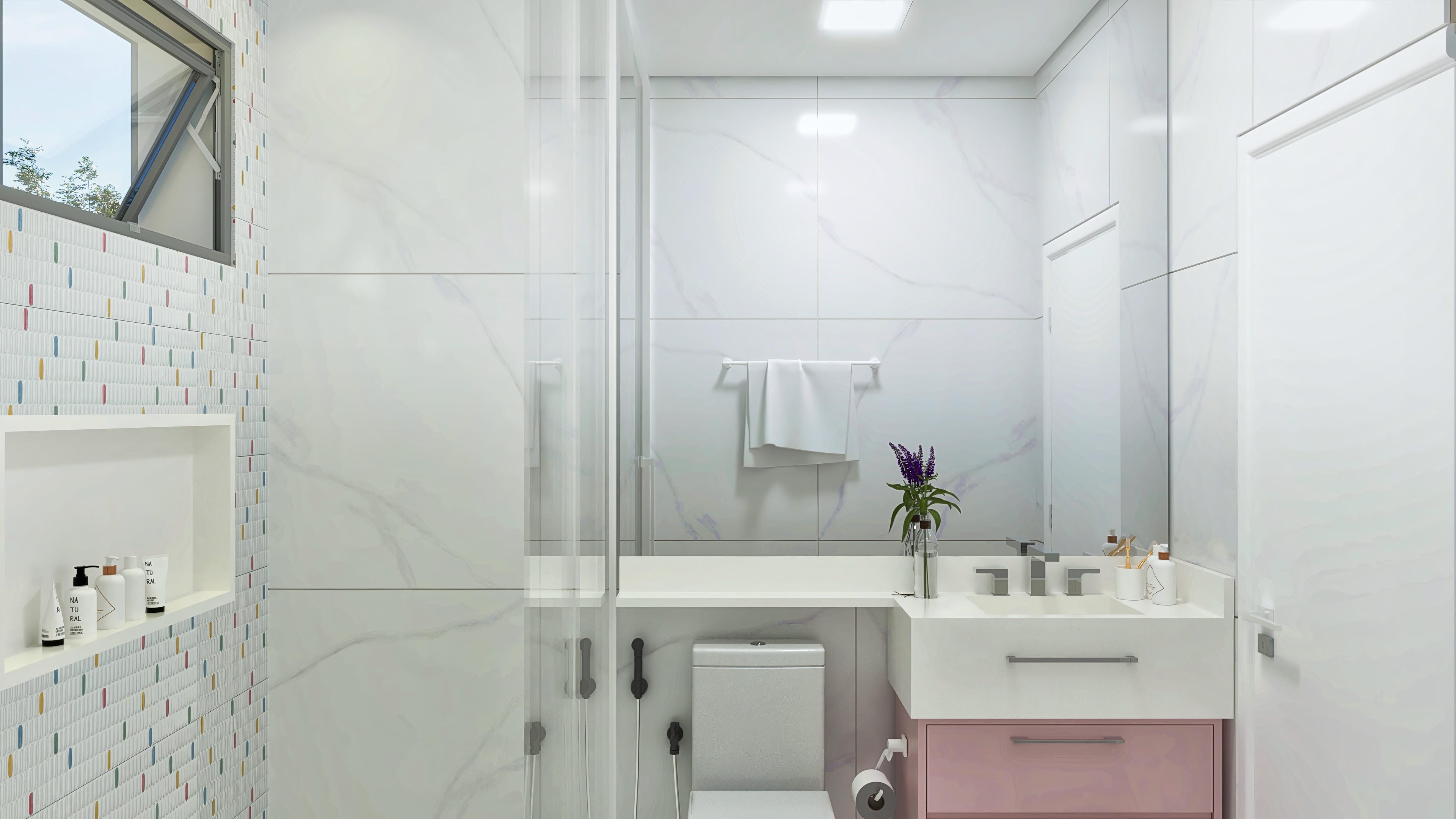 Baño con revestimientos modernos, destacando la pared texturizada con detalles de colores y amplia encimera con lavabo esculpido.