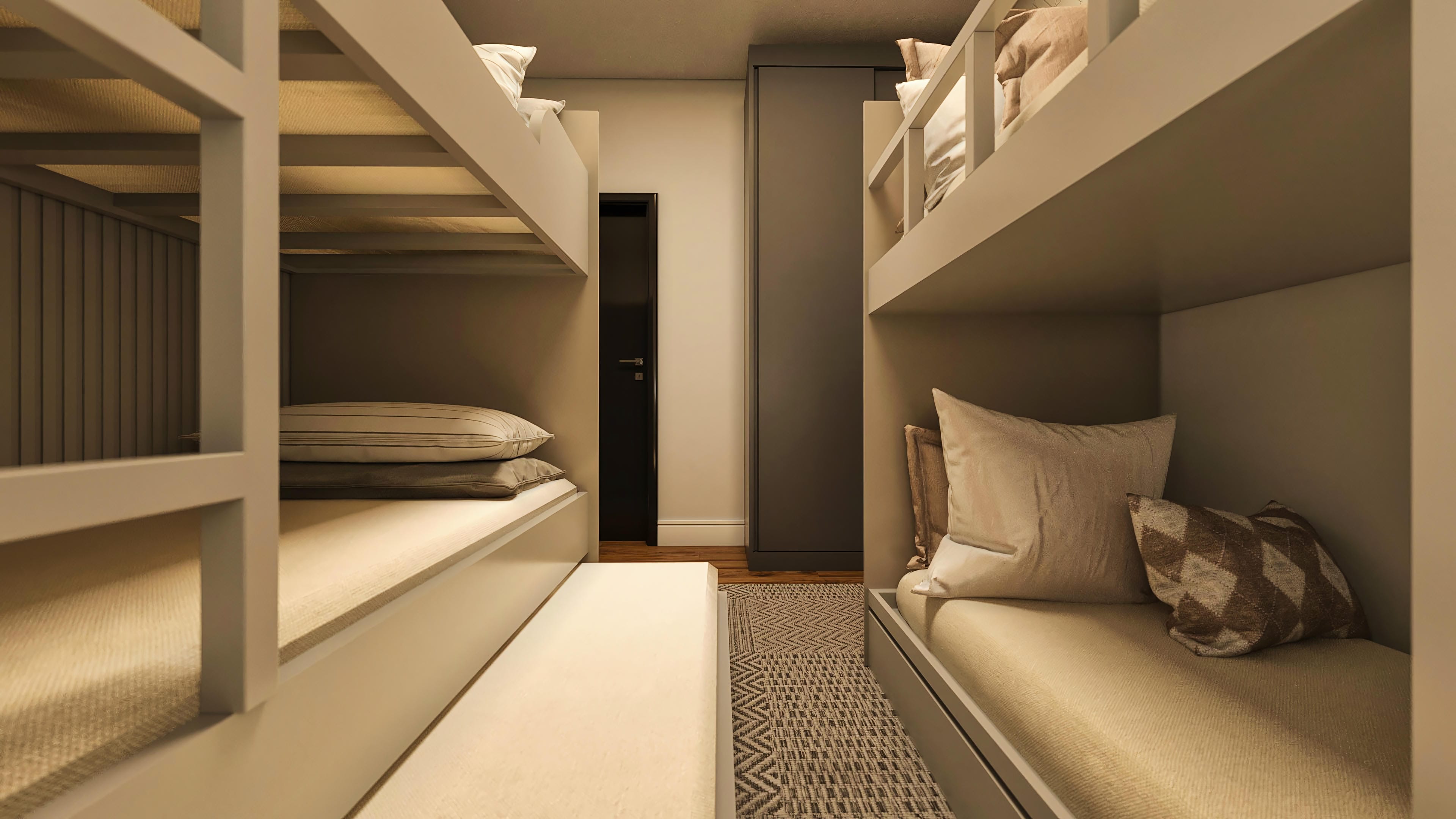 Environment with bunk beds in neutral tones, featuring functional and minimalist design. Bedding and pillows in soft colors add comfort.