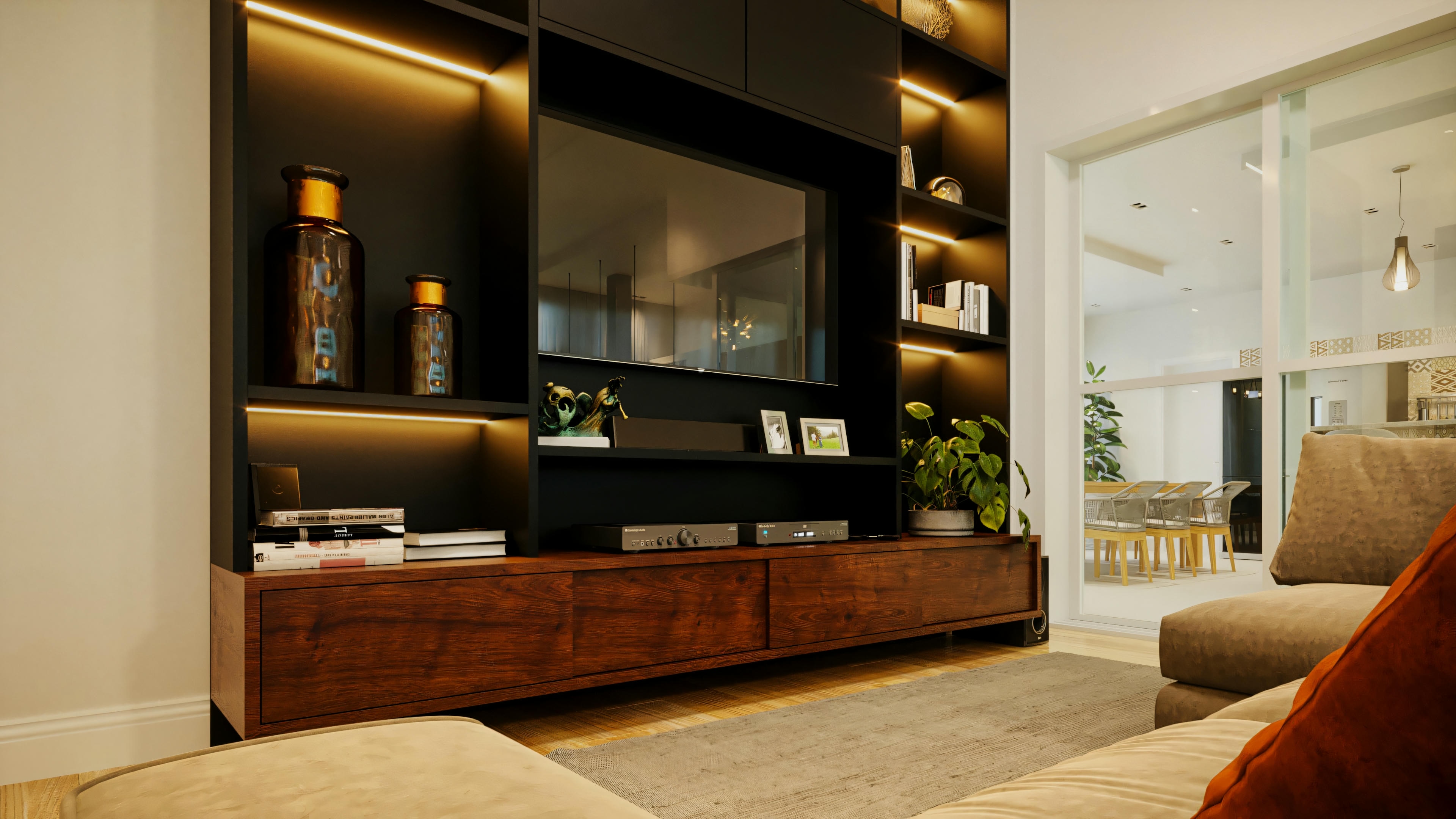 Detail of black TV panel with built-in lighting on shelves, wooden rack and decoration, in living room of house with 3 suites.