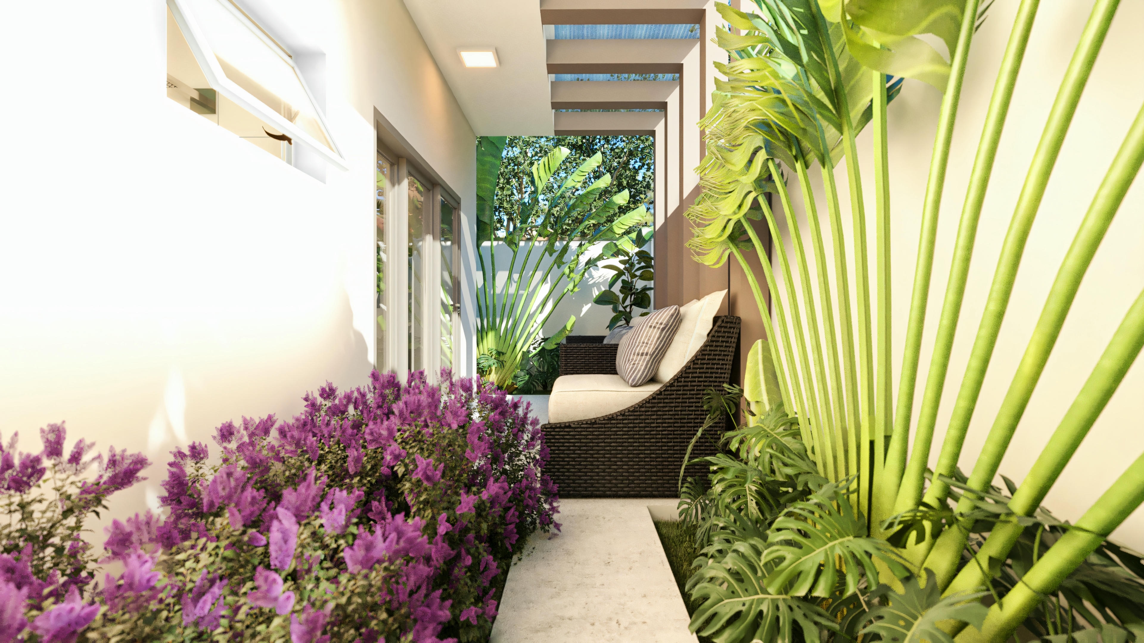 View of an indoor pool focusing on water features and seating areas.