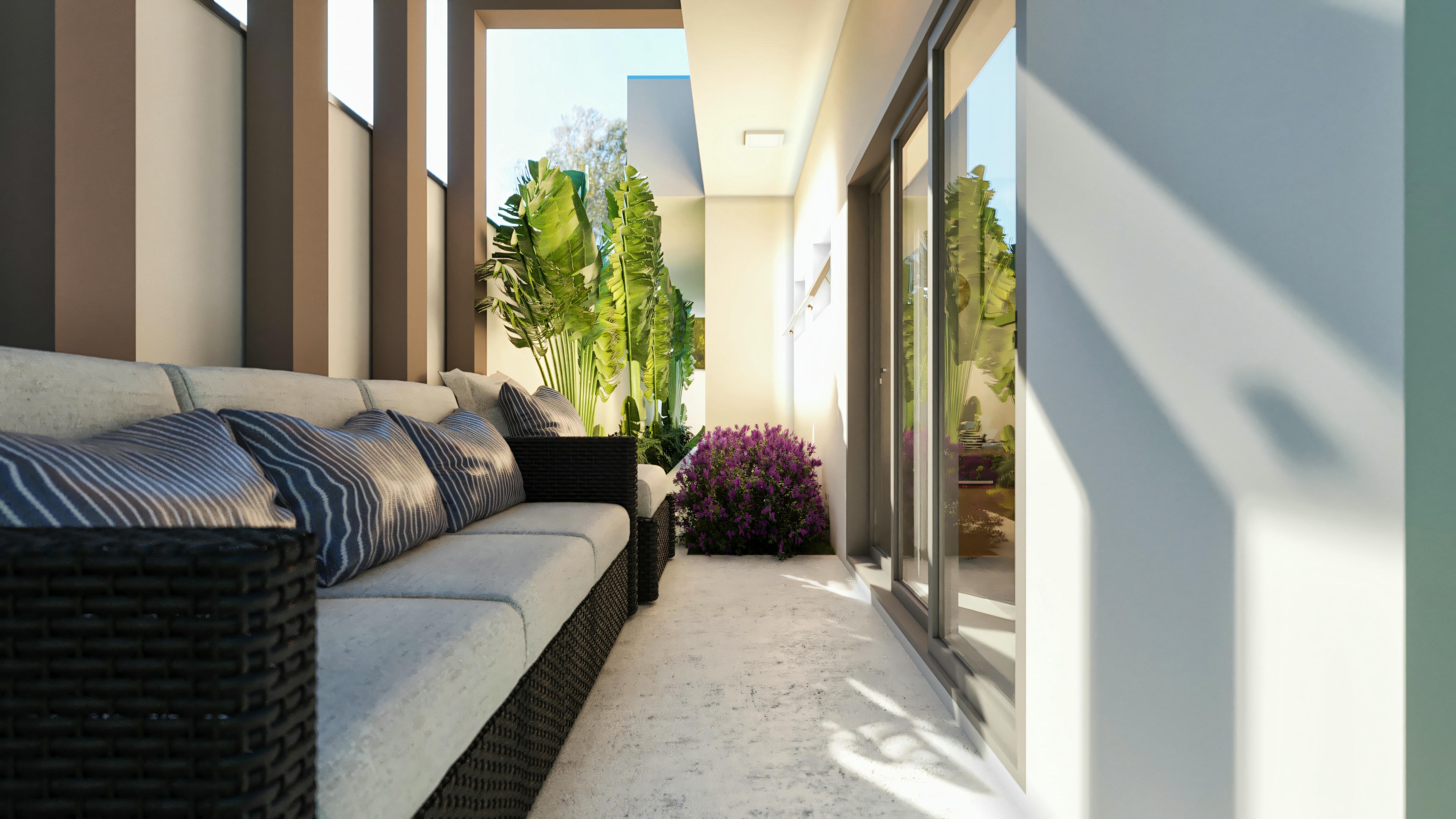 Outdoor space or balcony with seating and a city view at night.
