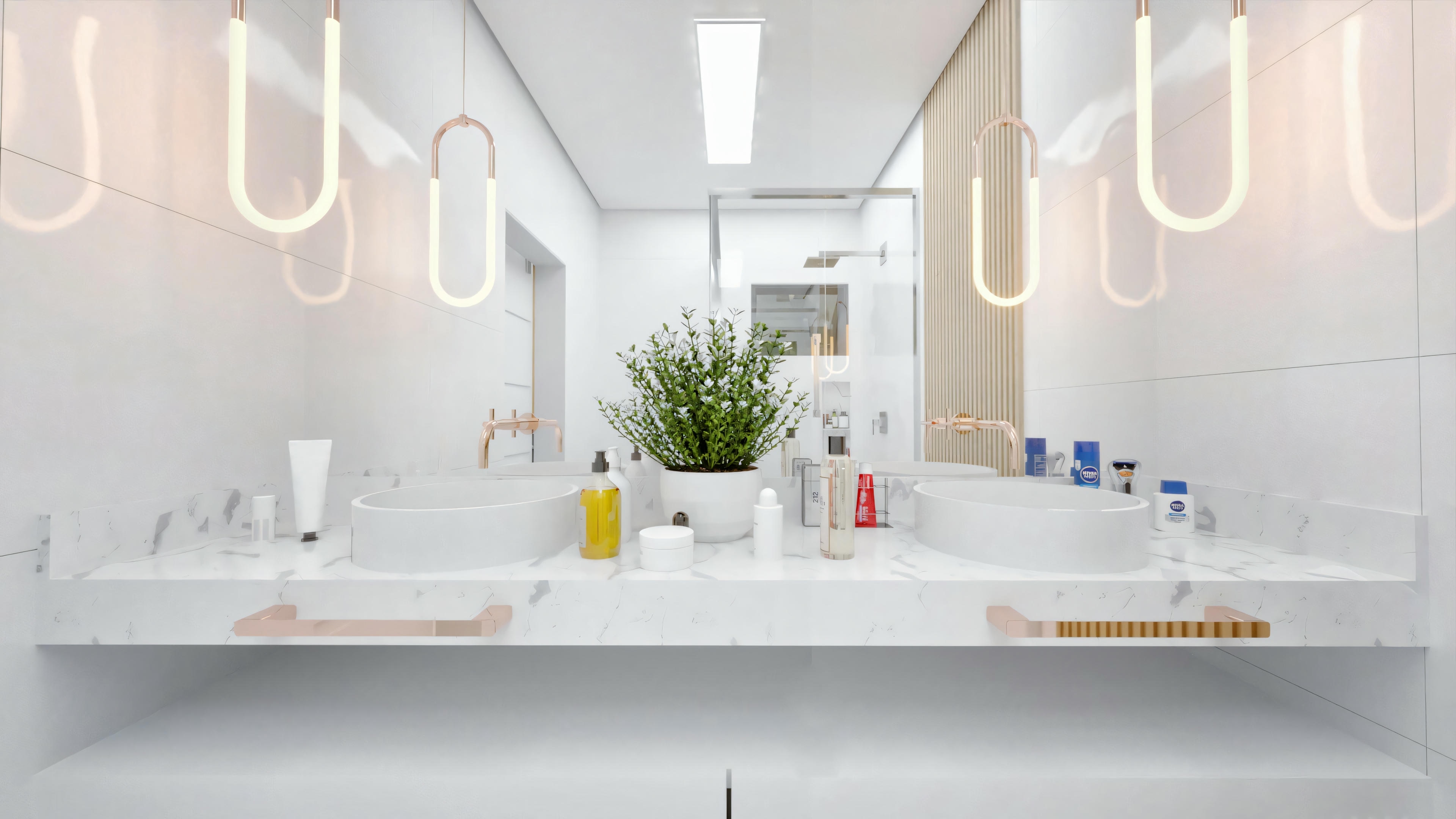Baño moderno con lavabo doble, grandes espejos y luminarias colgantes.