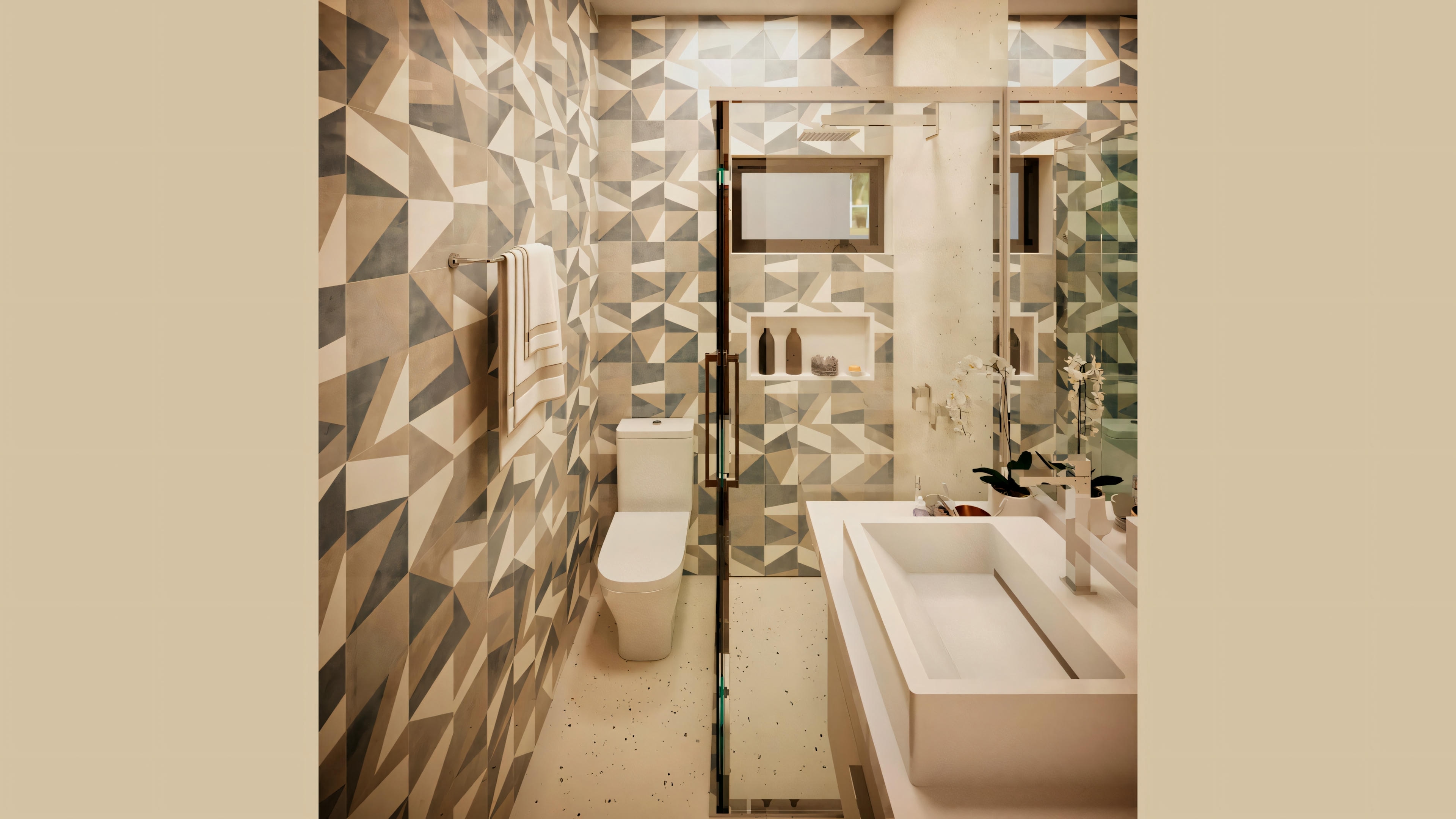 A modern bathroom with patterned tiles on the walls, a toilet, and a bathtub with visible faucets.