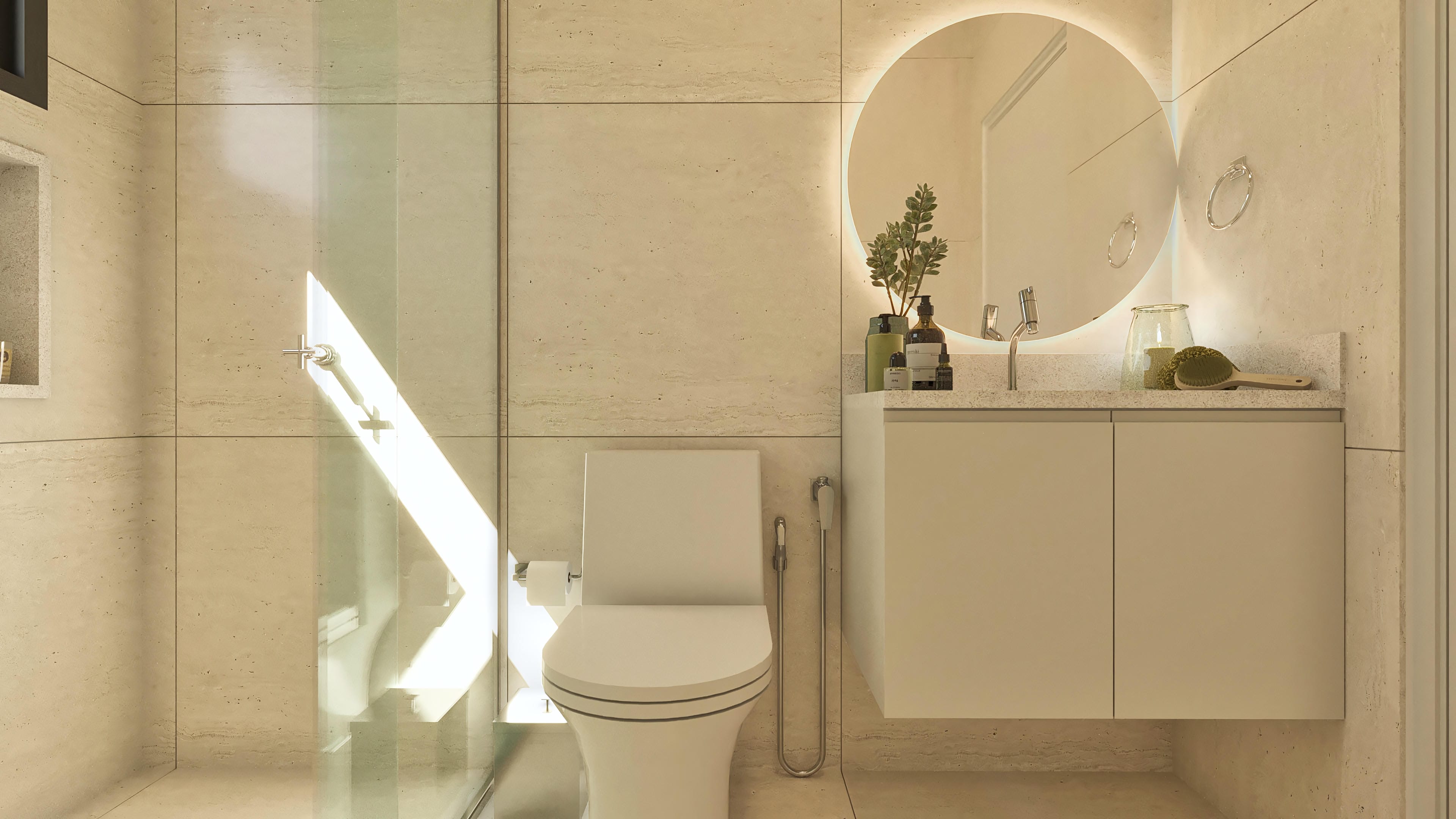 Modern bathroom detail with stone cladding, white sanitary ware, and chrome fixtures, including an illuminated circular mirror and countertop with suspended cabinet.
