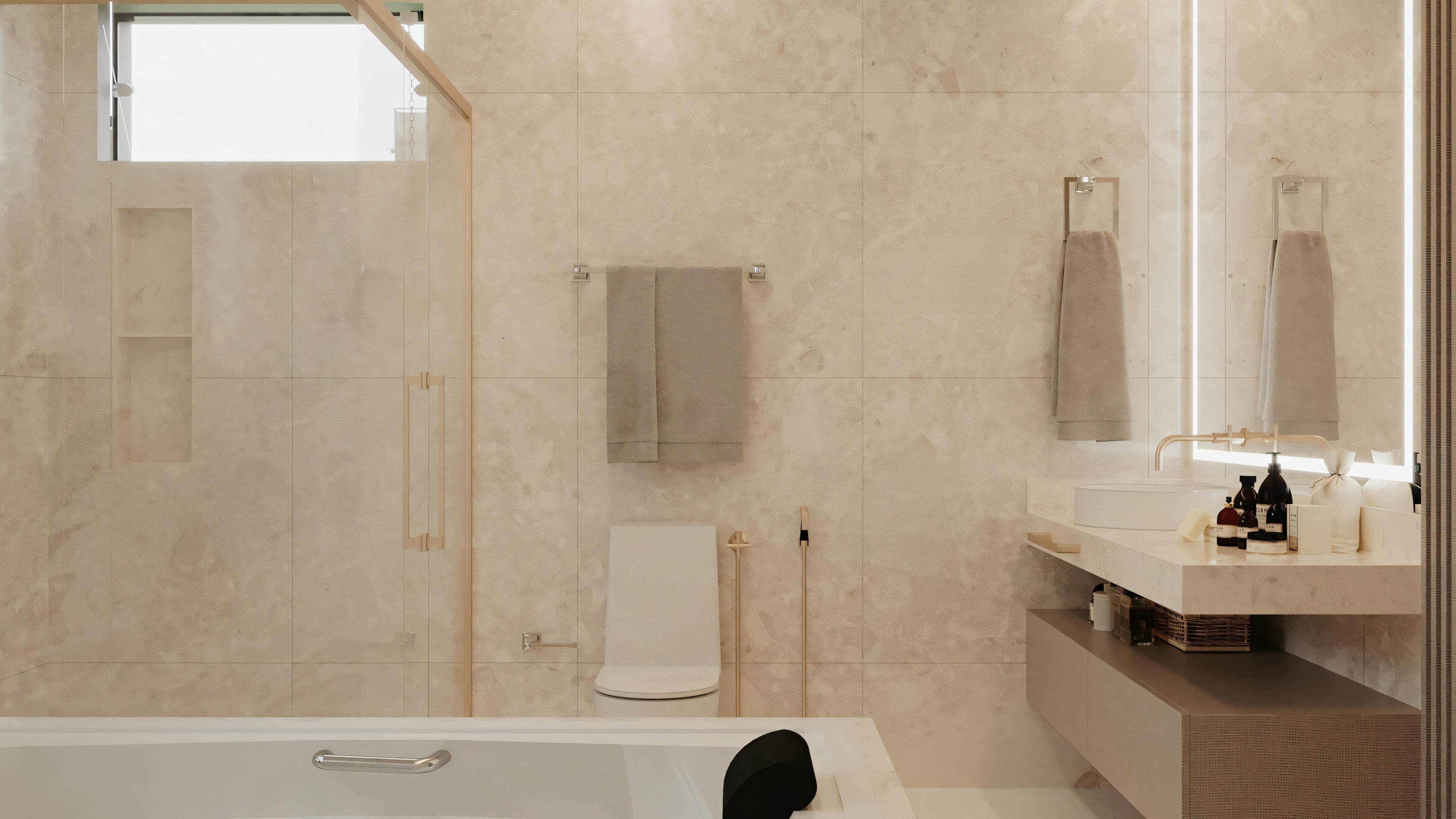 A bathroom with a walk-in shower and vanity area.