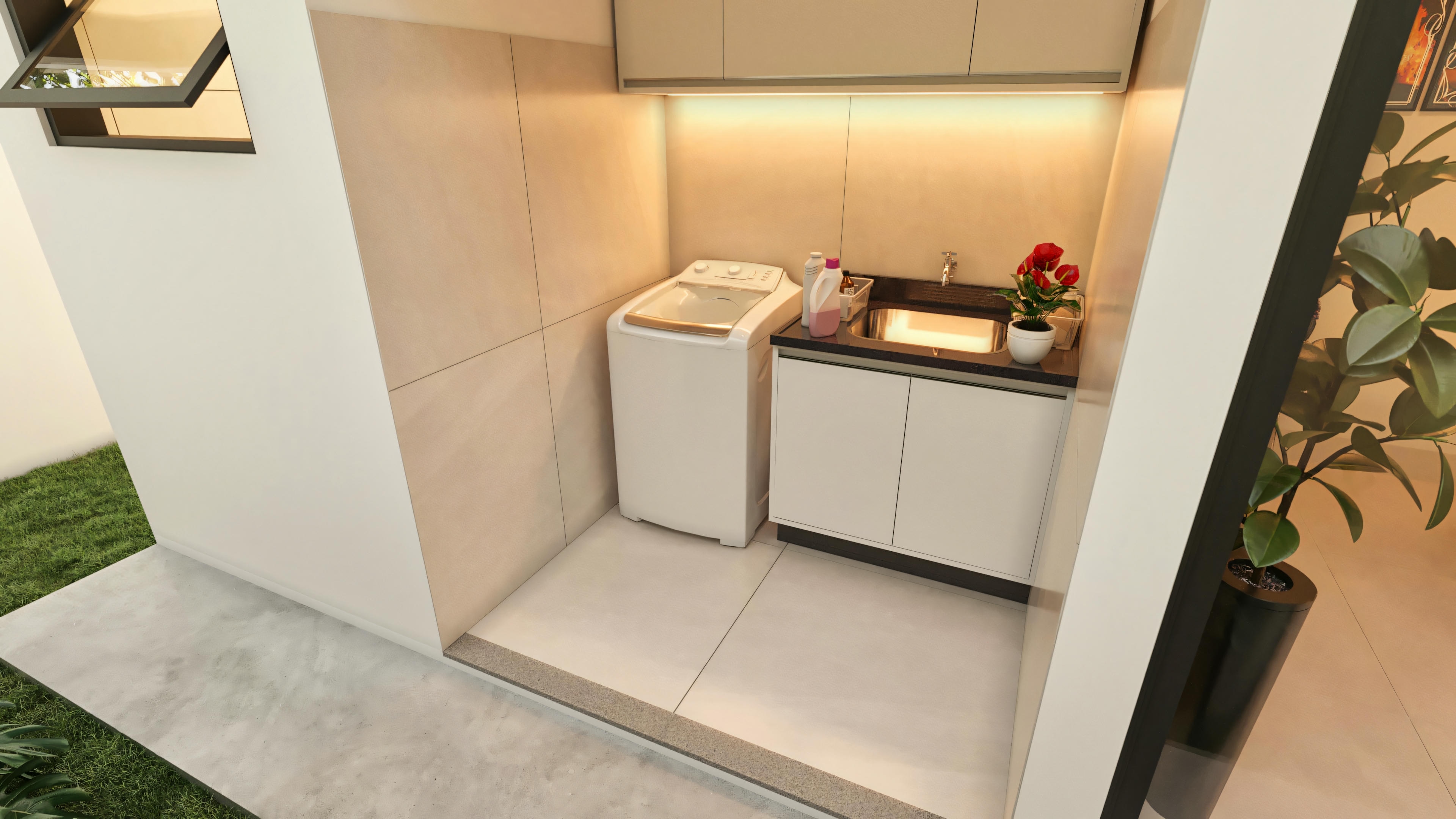 Service area of a modern 3-bedroom house, angled view showing washing machine, tank with cabinet, overhead cabinets, and access to an external service area or backyard.