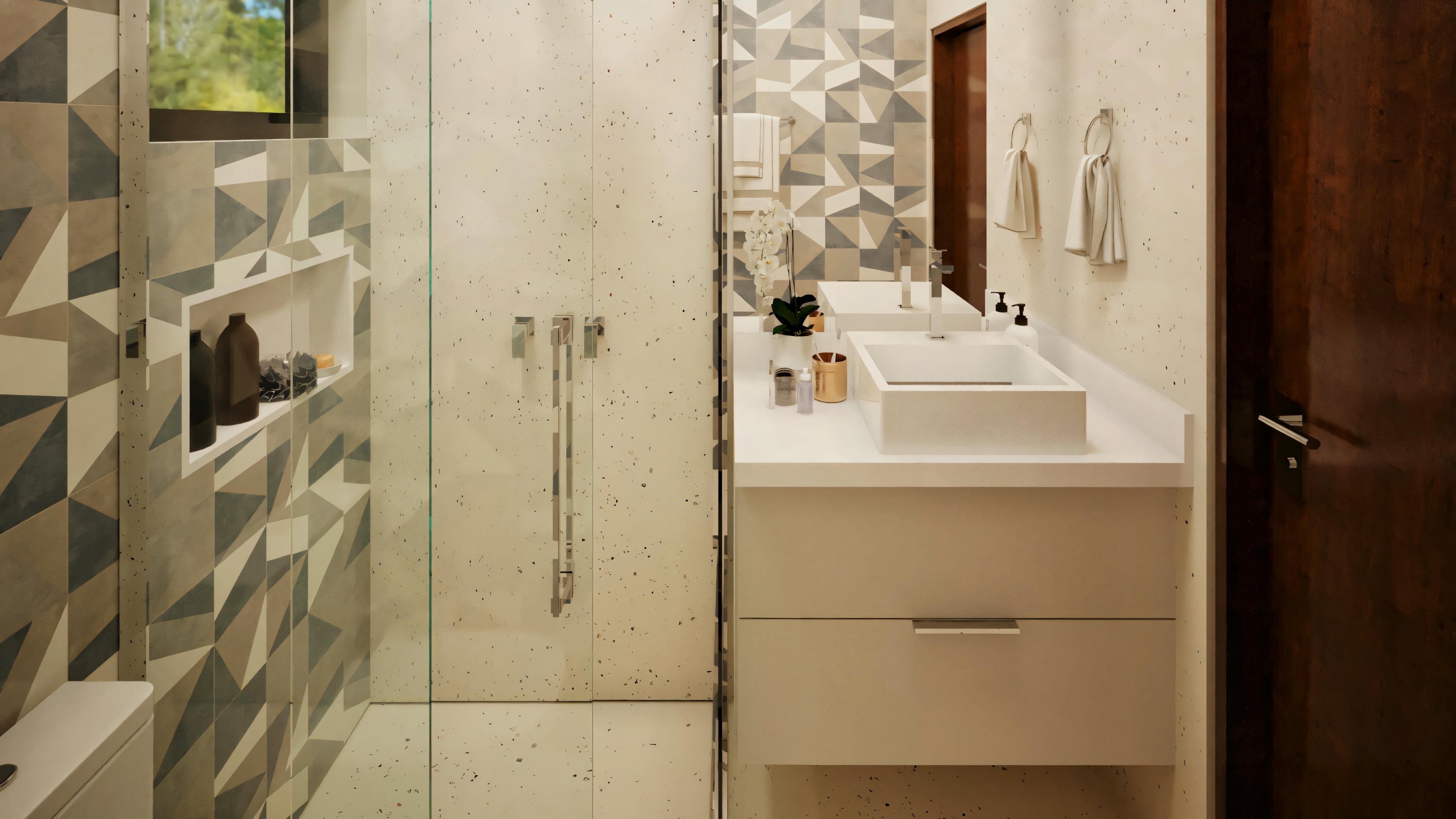 Modern bathroom with a sink, mirror, and shower area.