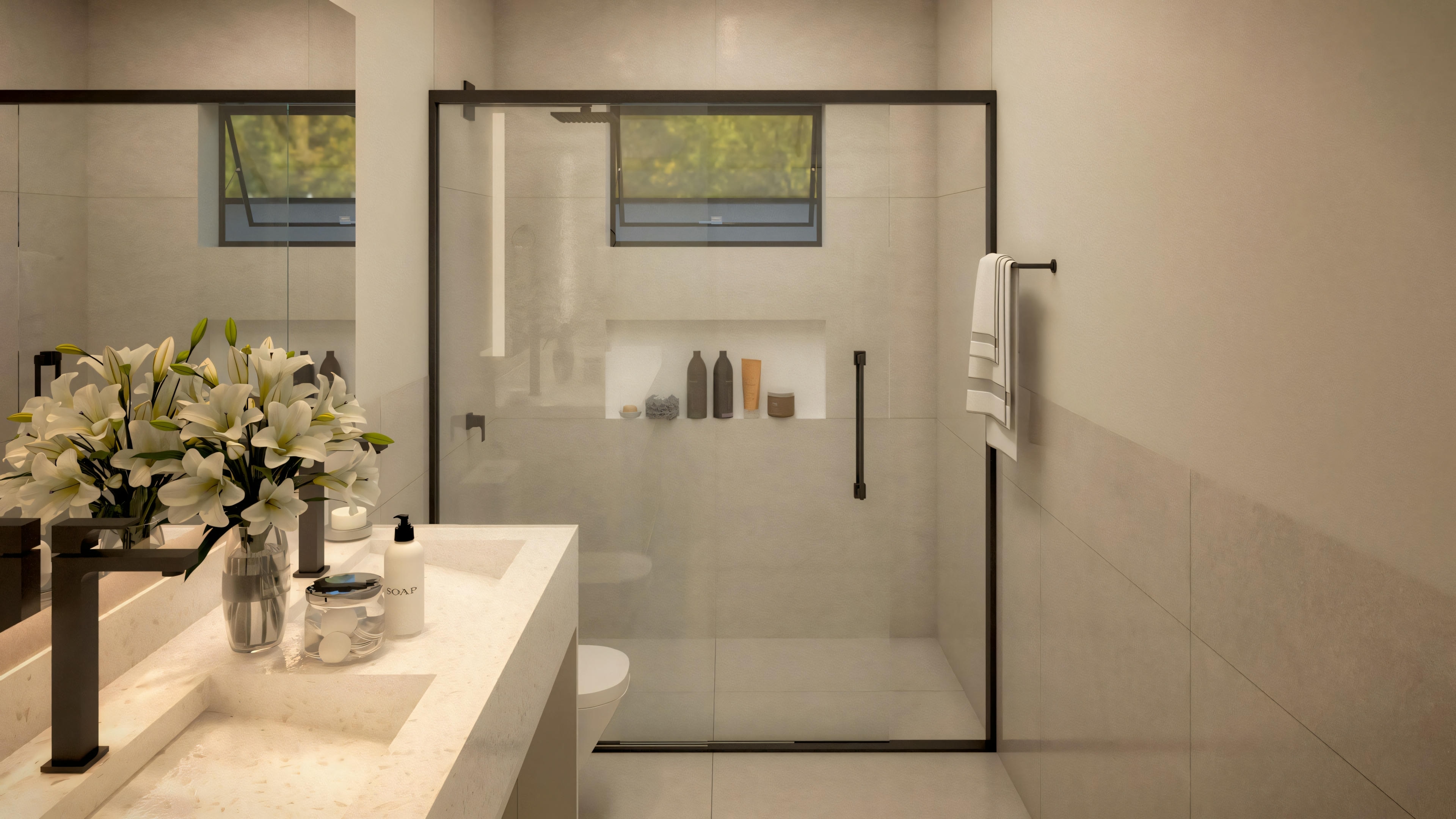A modern bathroom with a white sink, a large mirror, and a shower area with a glass partition.
