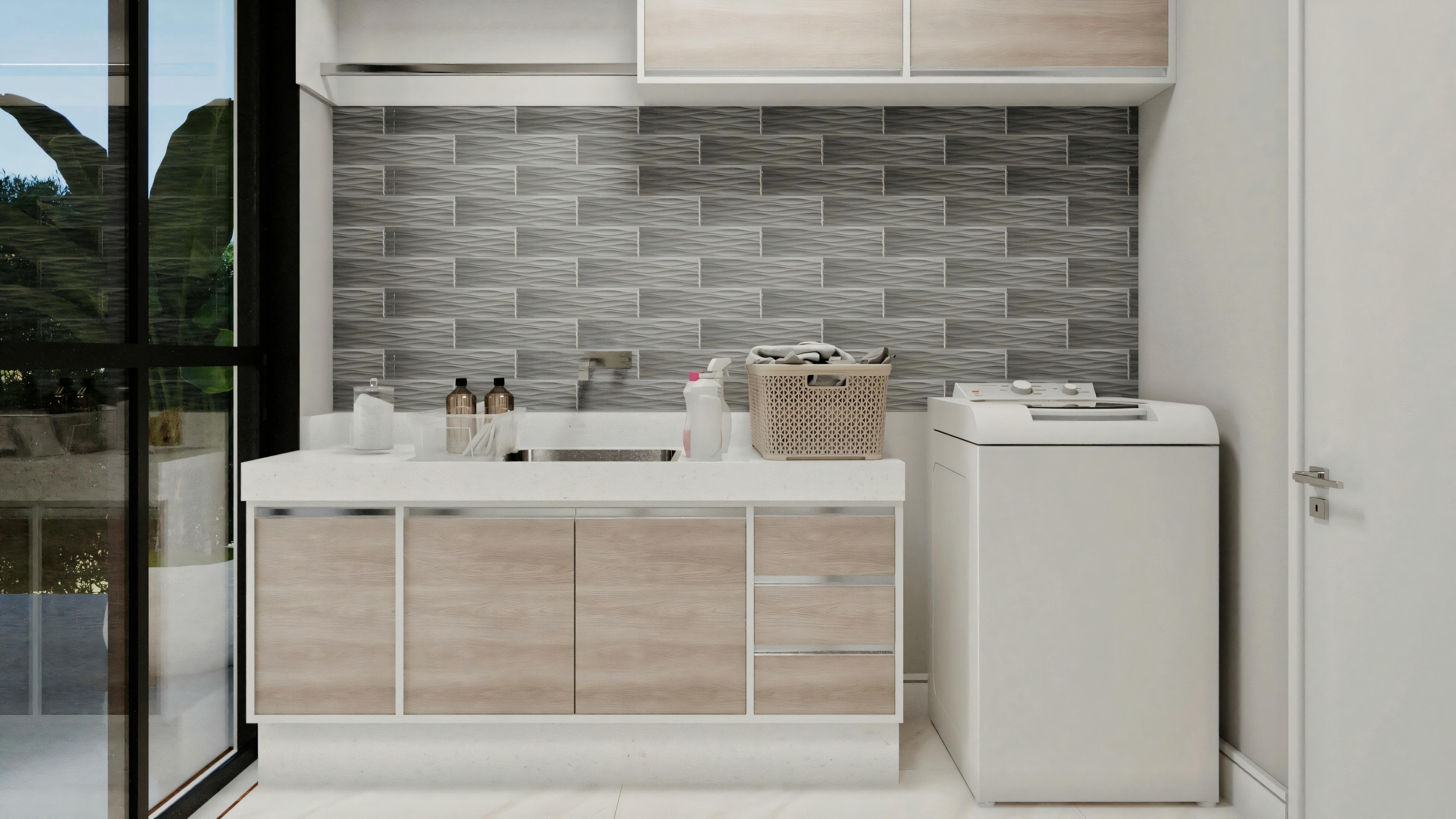 Lavabo de baño moderno con un lavamanos, varios cajones de almacenamiento y una lavadora a la derecha.