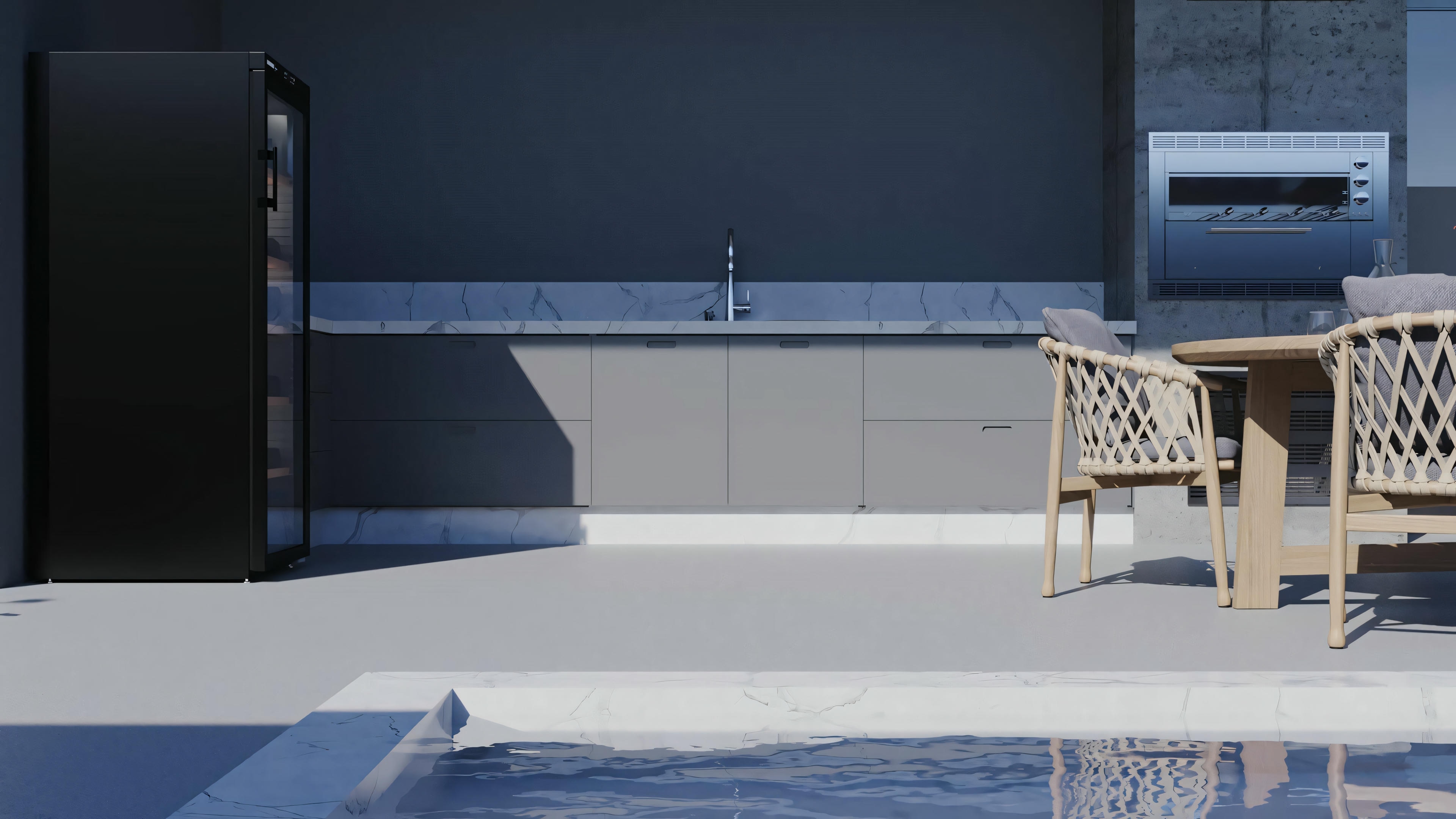 Outdoor patio area with a pool, two lounge chairs, and a building in the background.