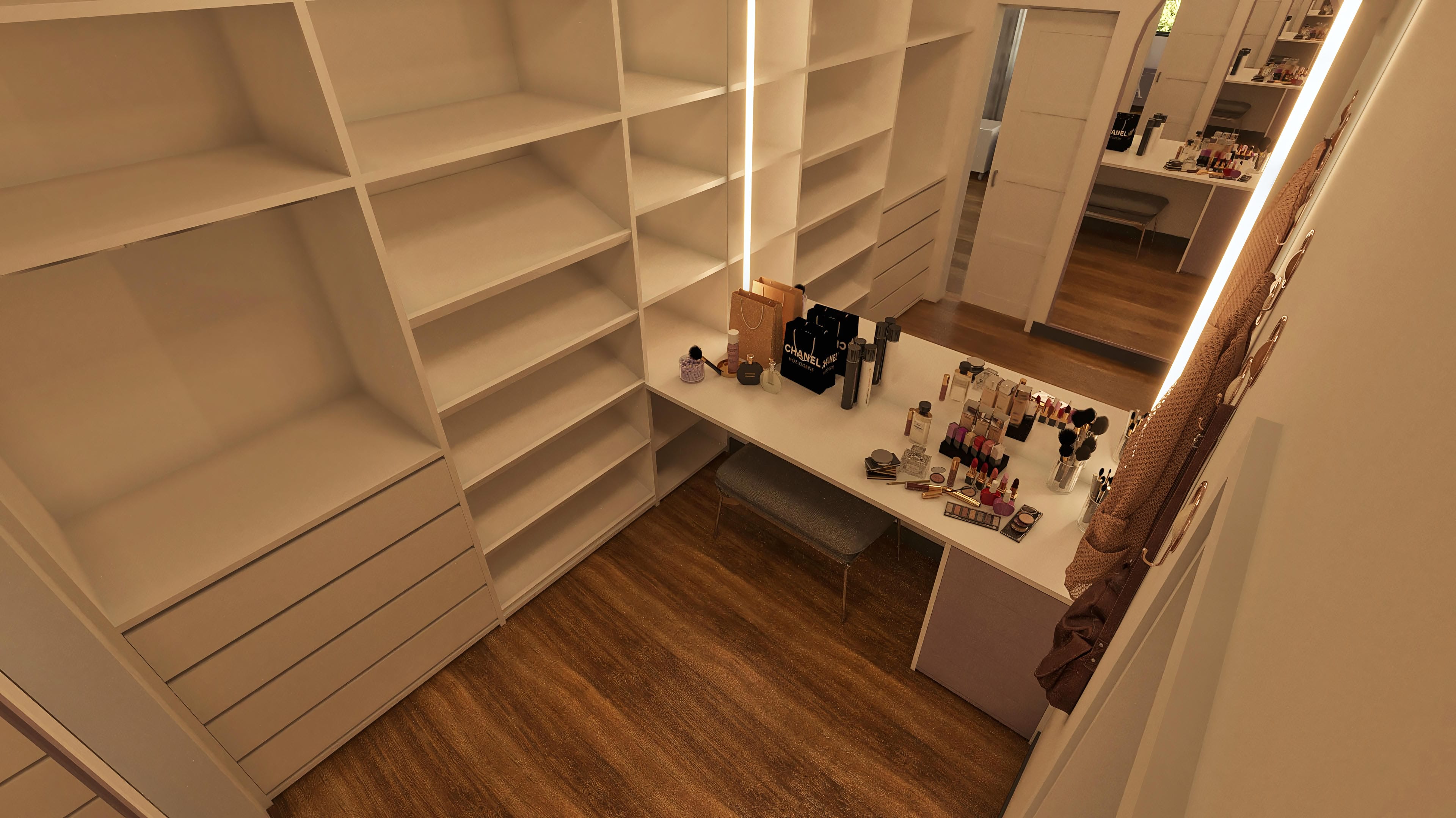 Interior moderno con vestidor espacioso, estantes en L y tocador de maquillaje con iluminación LED. Suelo de madera y amplio espacio para organización.