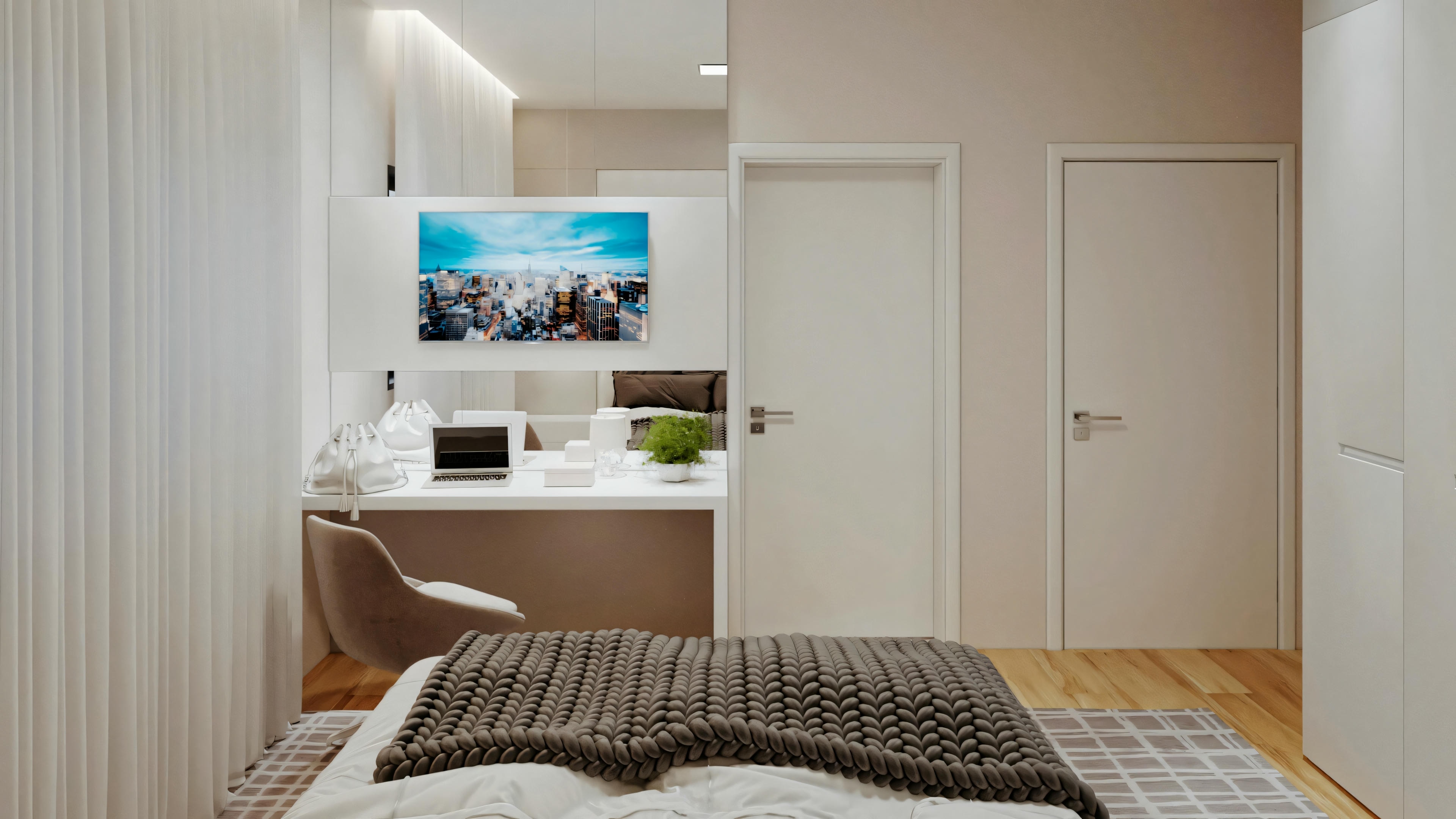 Un dormitorio con cama hecha frente a una televisión montada en la pared y papel pintado estampado.