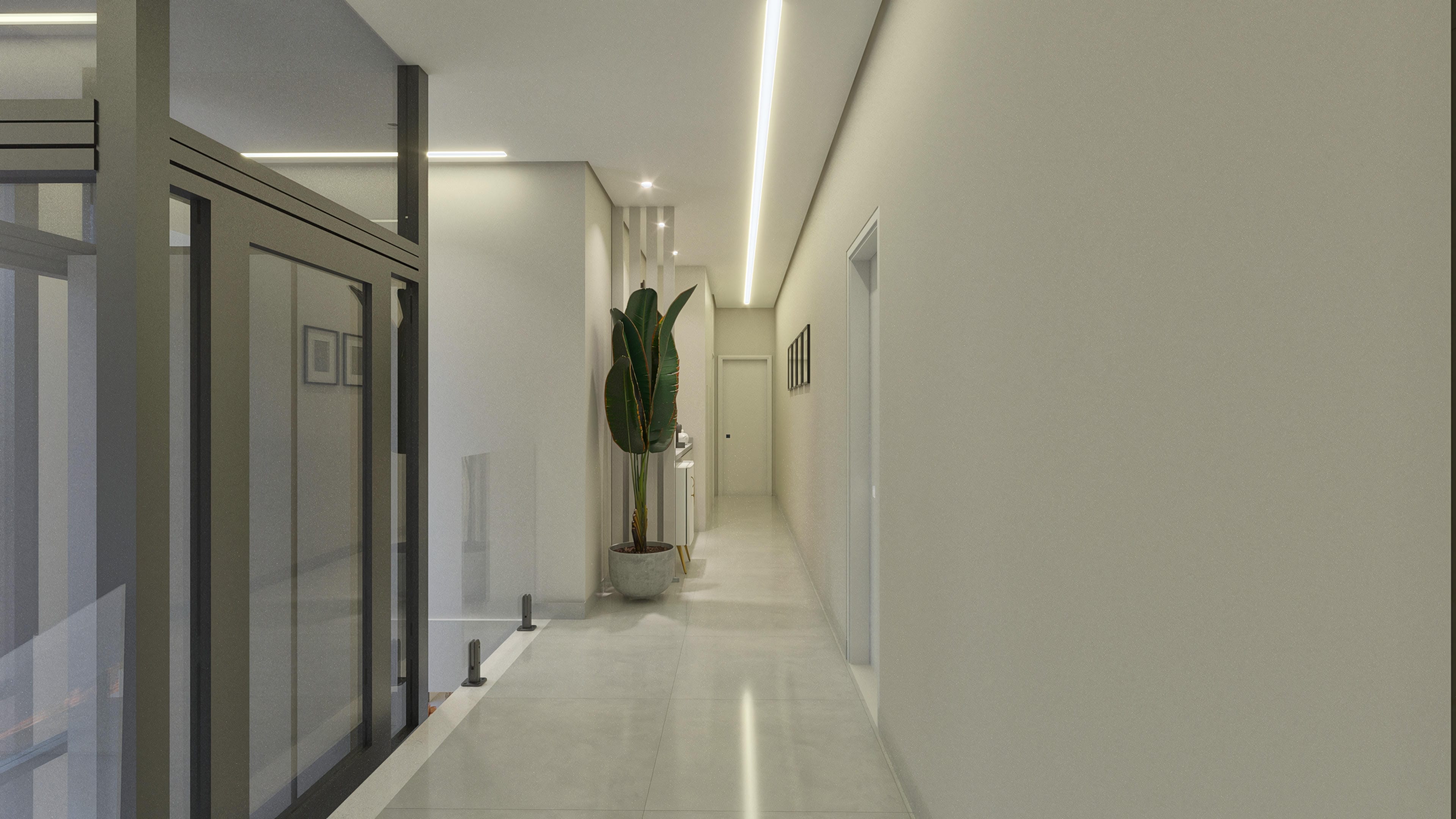 Interior de una casa de dos pisos moderna, con pasillo iluminado por focos empotrados en el techo. Suelo en porcelanato claro. Destaca una puerta de cristal y una planta decorativa.