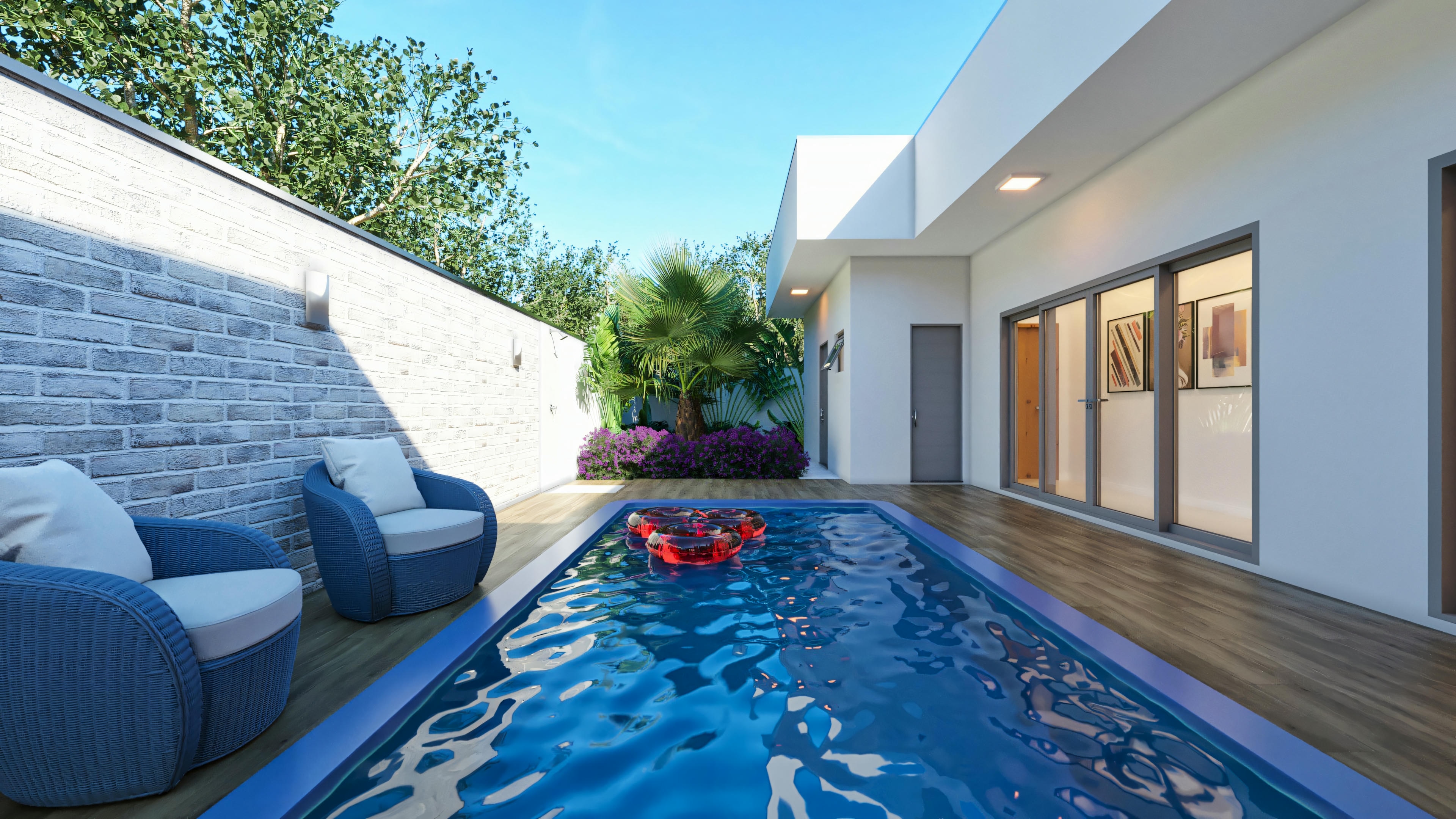 Área de piscina exterior con grandes ventanas y tragaluz.