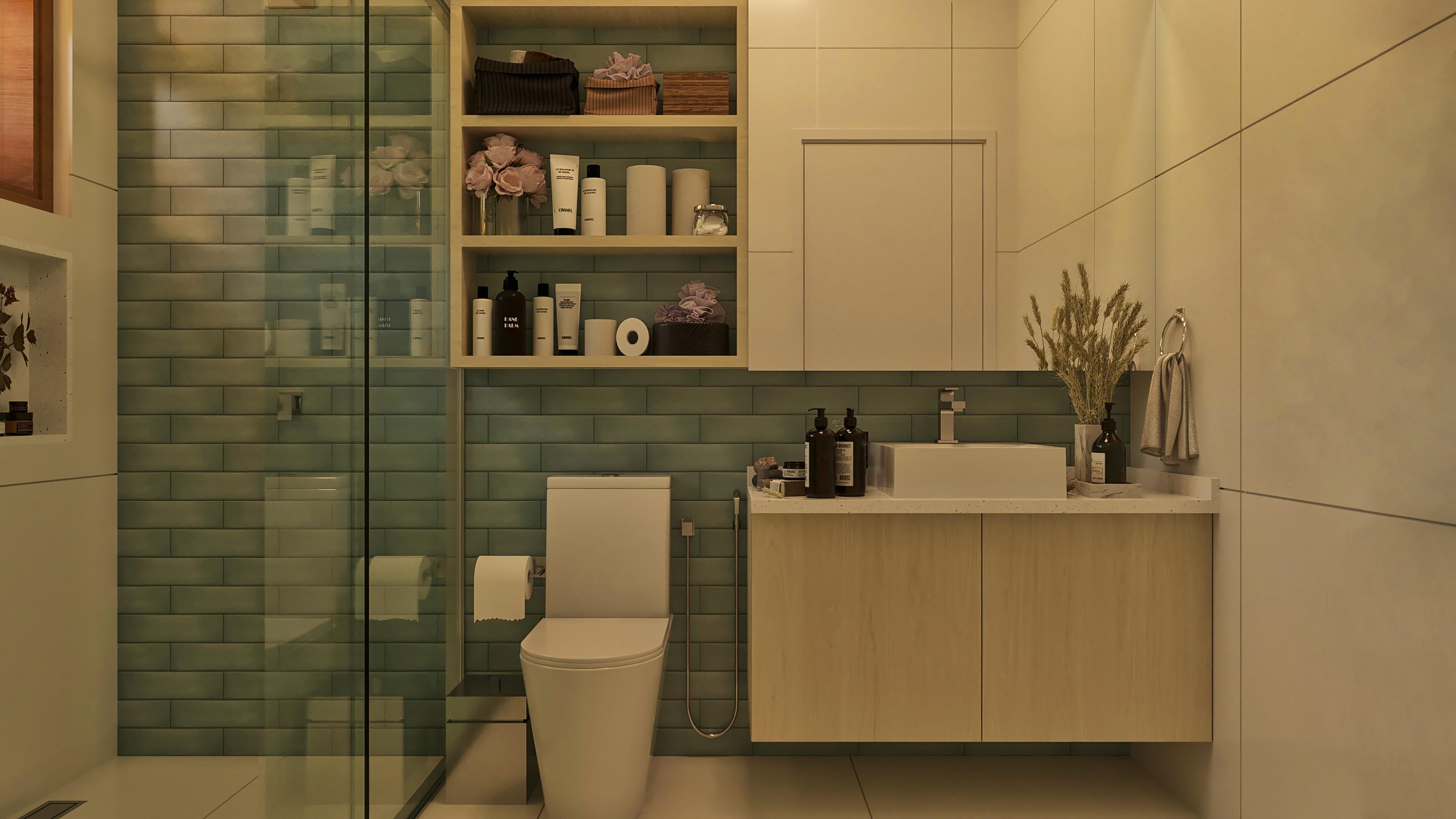 Baño moderno con revestimiento en azulejo verde, barra de piedra clara con lavabo integrado y armarios de madera.