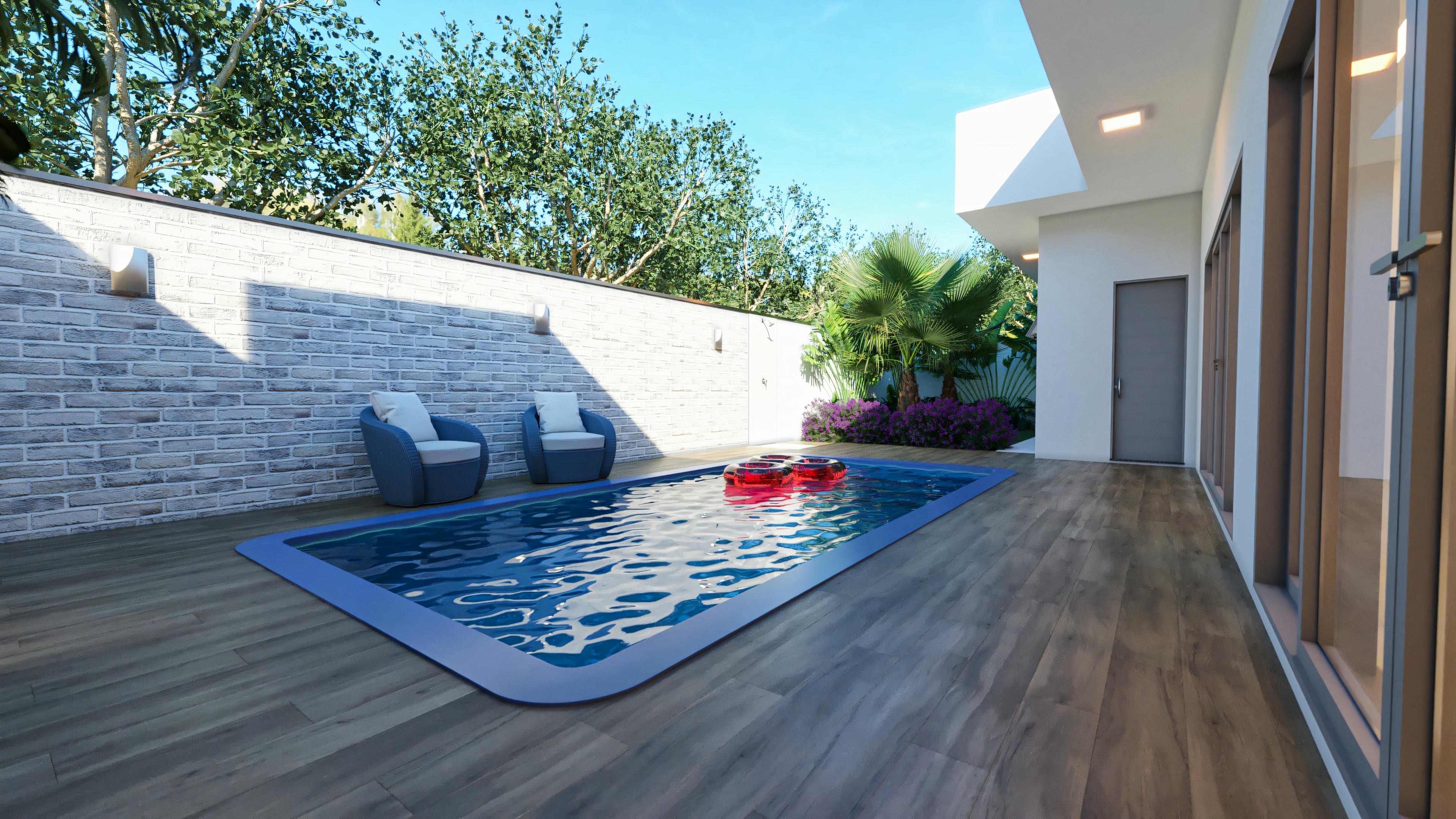 An outdoor patio with greenery and comfortable furniture.