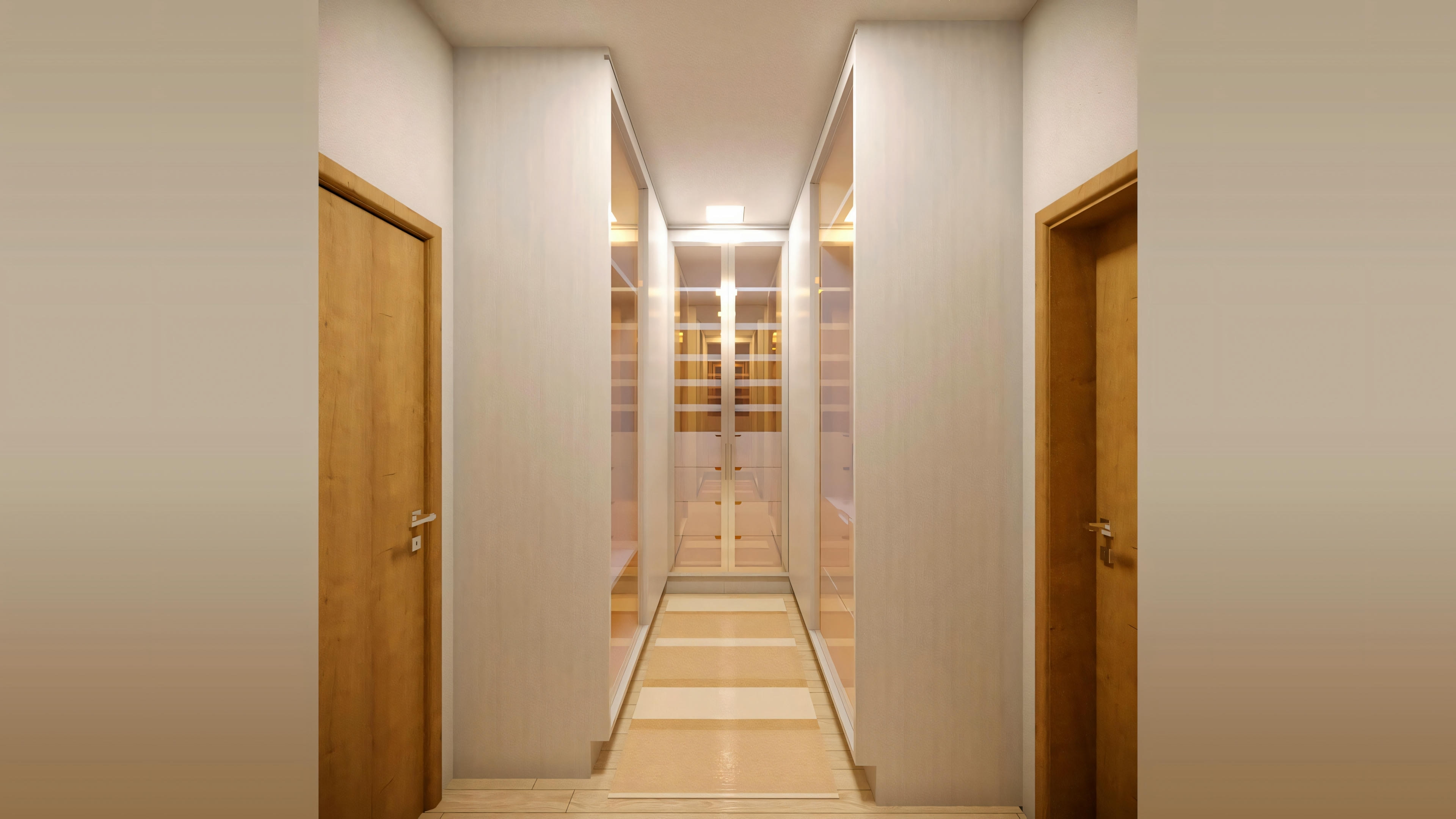 A modern hallway with recessed ceiling lighting and doors on either side.