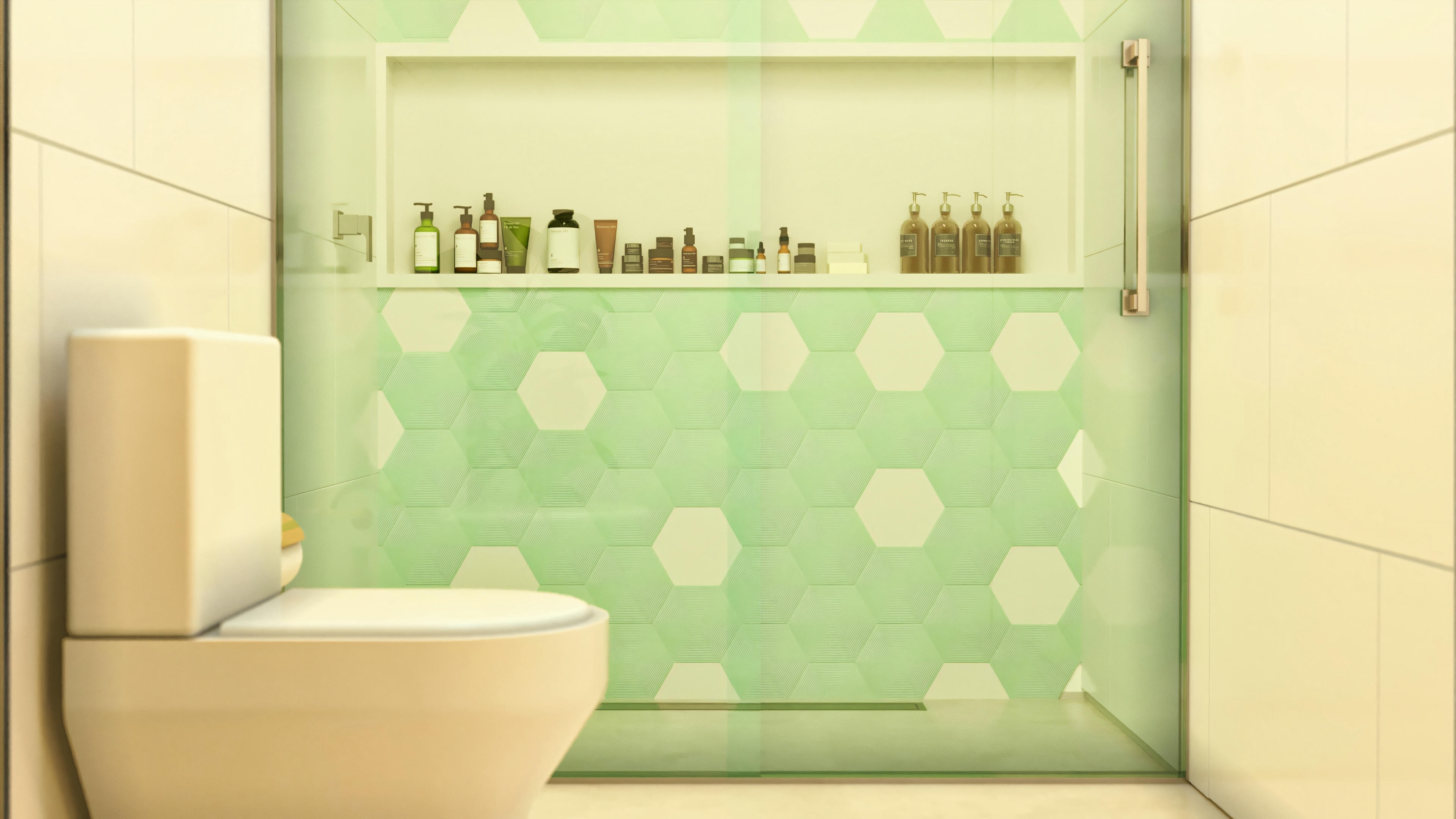 Detalhe do banheiro com vaso sanitário branco e box com porta de vidro, nicho embutido para produtos de higiene e parede do fundo com revestimento de pastilhas hexagonais em tons de verde e branco.