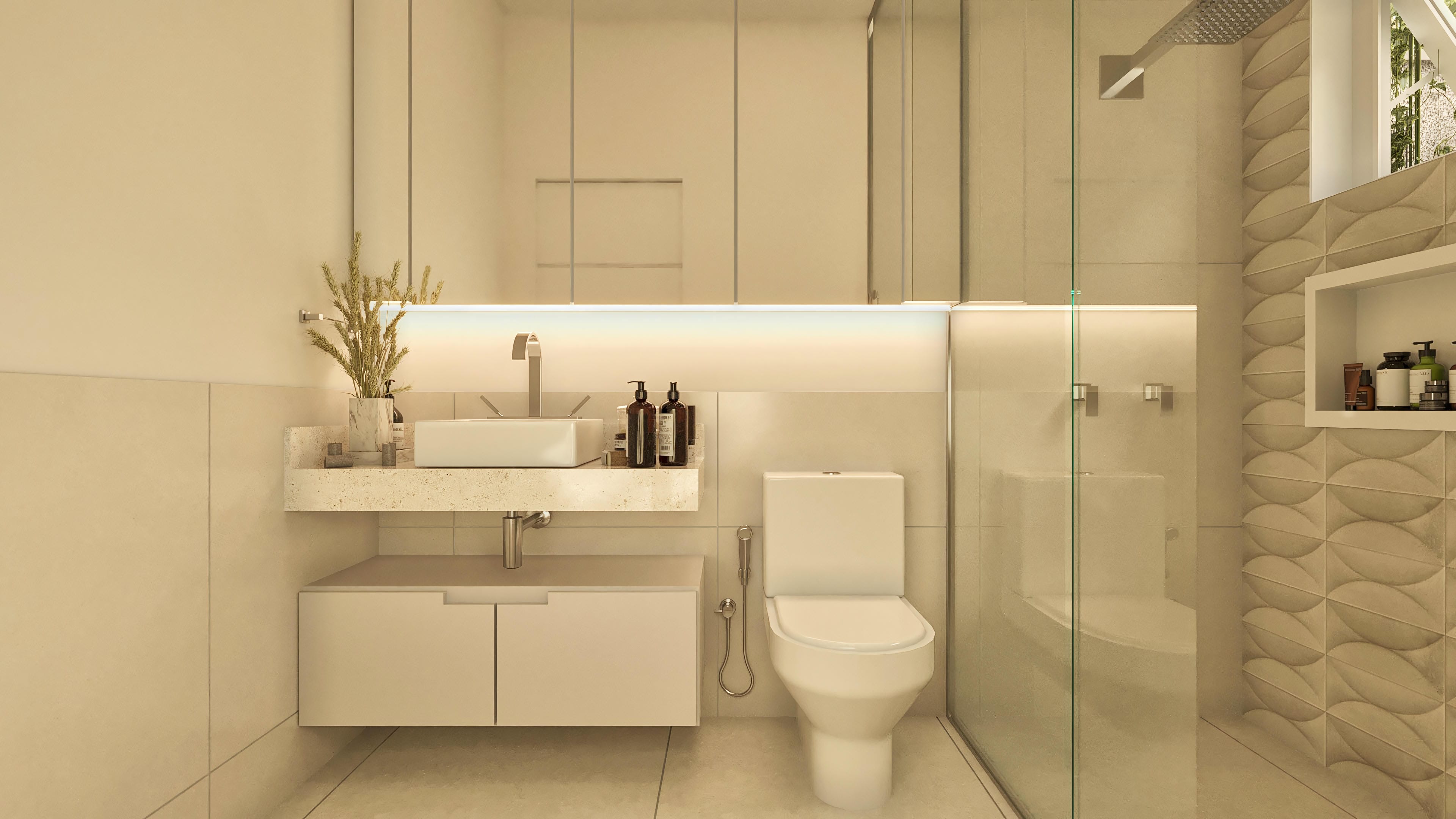 Detalle de un cuarto de baño moderno con encimera en piedra clara, lavabo rectangular, grifo cromado, armario suspendido y espejo con iluminación empotrada. El área de la ducha cuenta con suelo y revestimiento en tonos neutros, con un detalle texturizado en la pared.