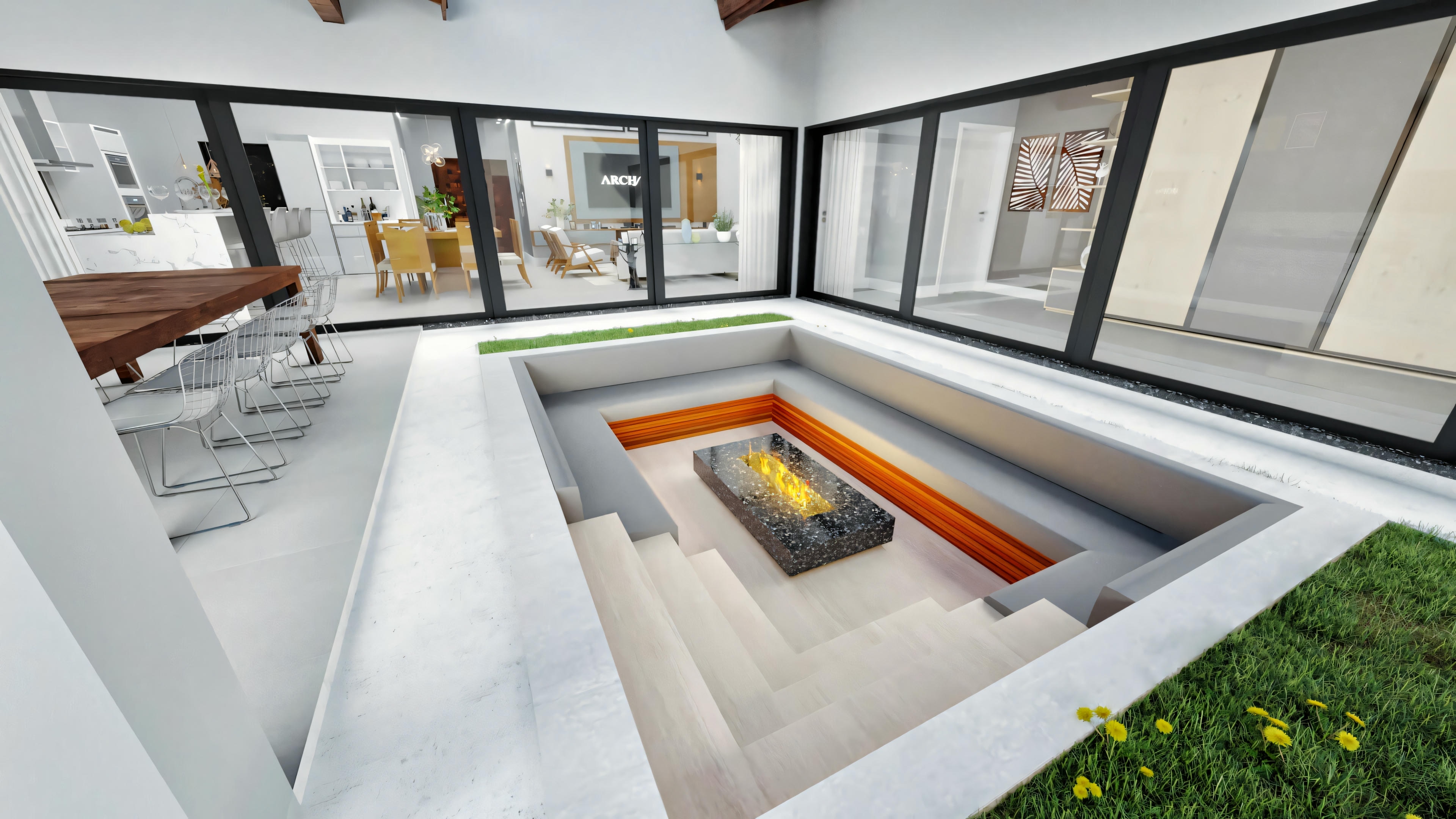 Espaço interior moderno com uma área rebaixada no chão, projetada como um espaço aconchegante para sentar ou relaxar.