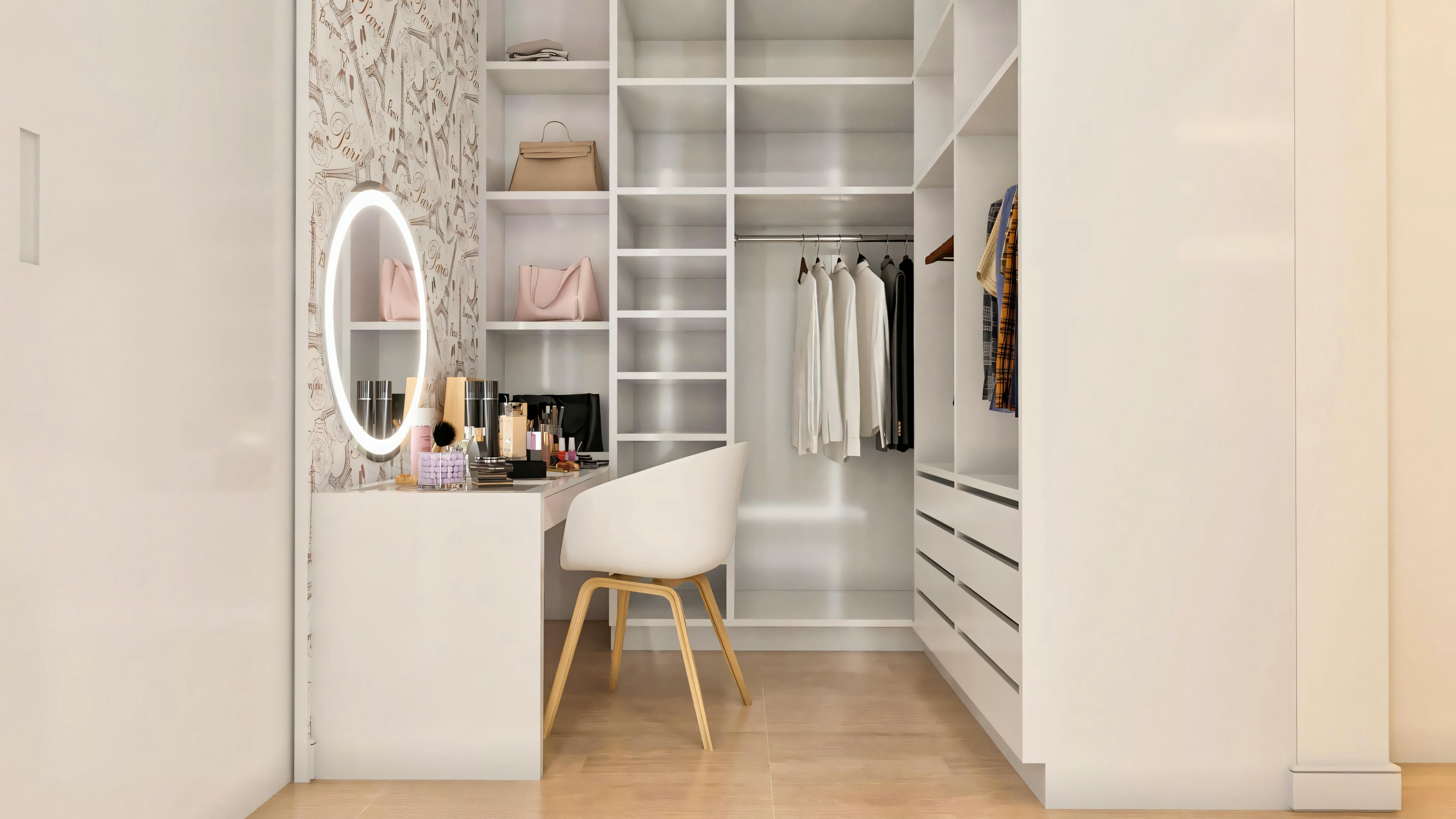 Master suite walk-in closet in a luxury house, with custom white cabinets and integrated vanity with themed wallpaper.