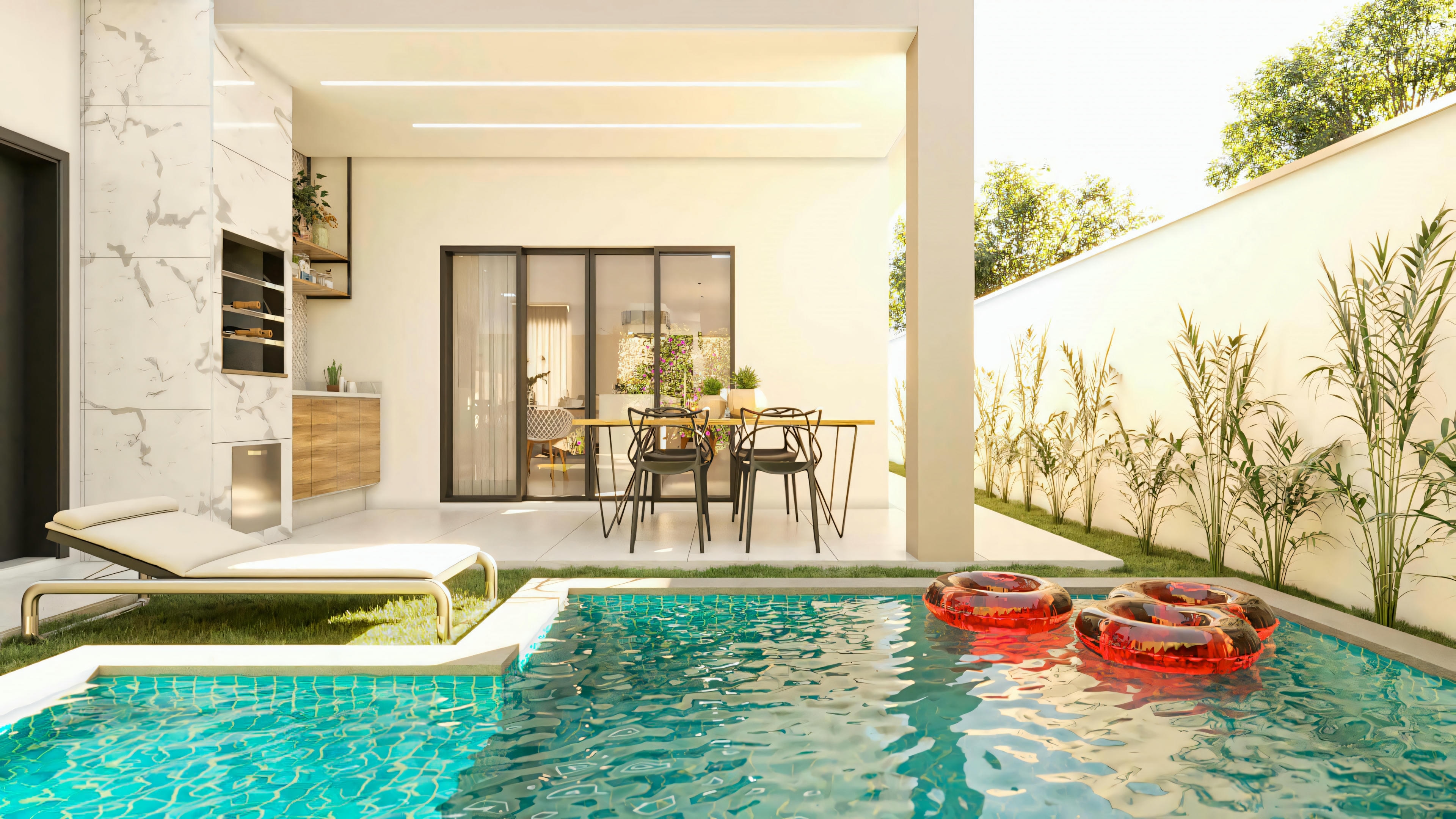 Perspective of the leisure area of the 194.7m² two-story house (10x25 lot) from the pool. In the foreground, the pool with crystal clear water; in the background, the covered gourmet space with barbecue, countertop, and outdoor furniture.