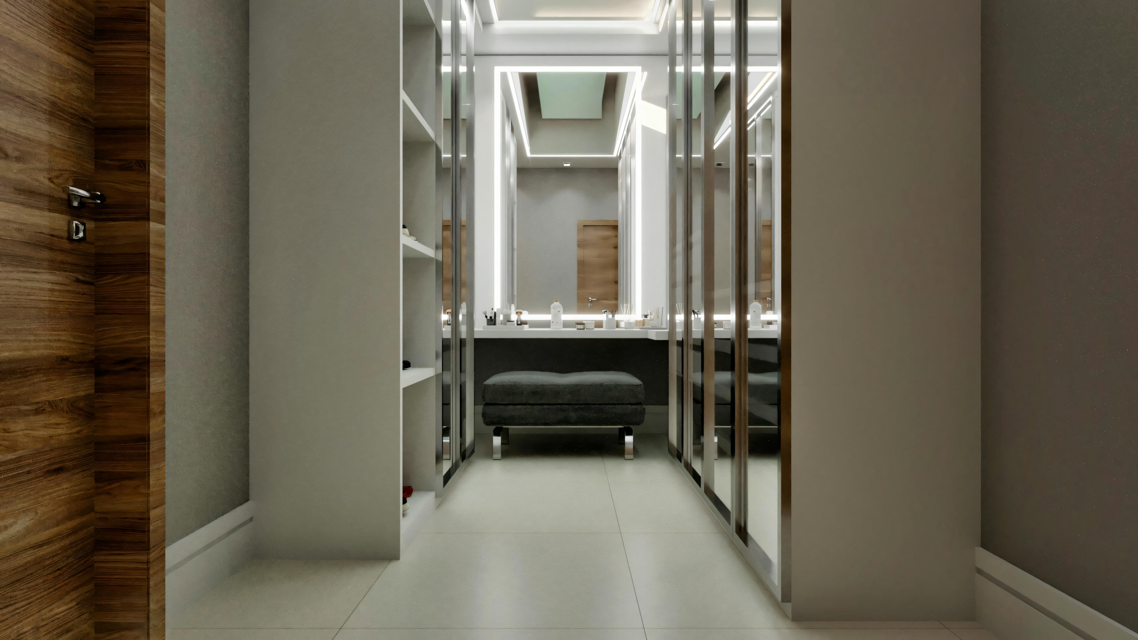Spacious closet with mirrored wardrobes, white open shelves, dressing table in the background with an illuminated mirror and upholstered gray bench, light wood flooring, and a wooden door on the left, part of a 4-suite neoclassical house project.