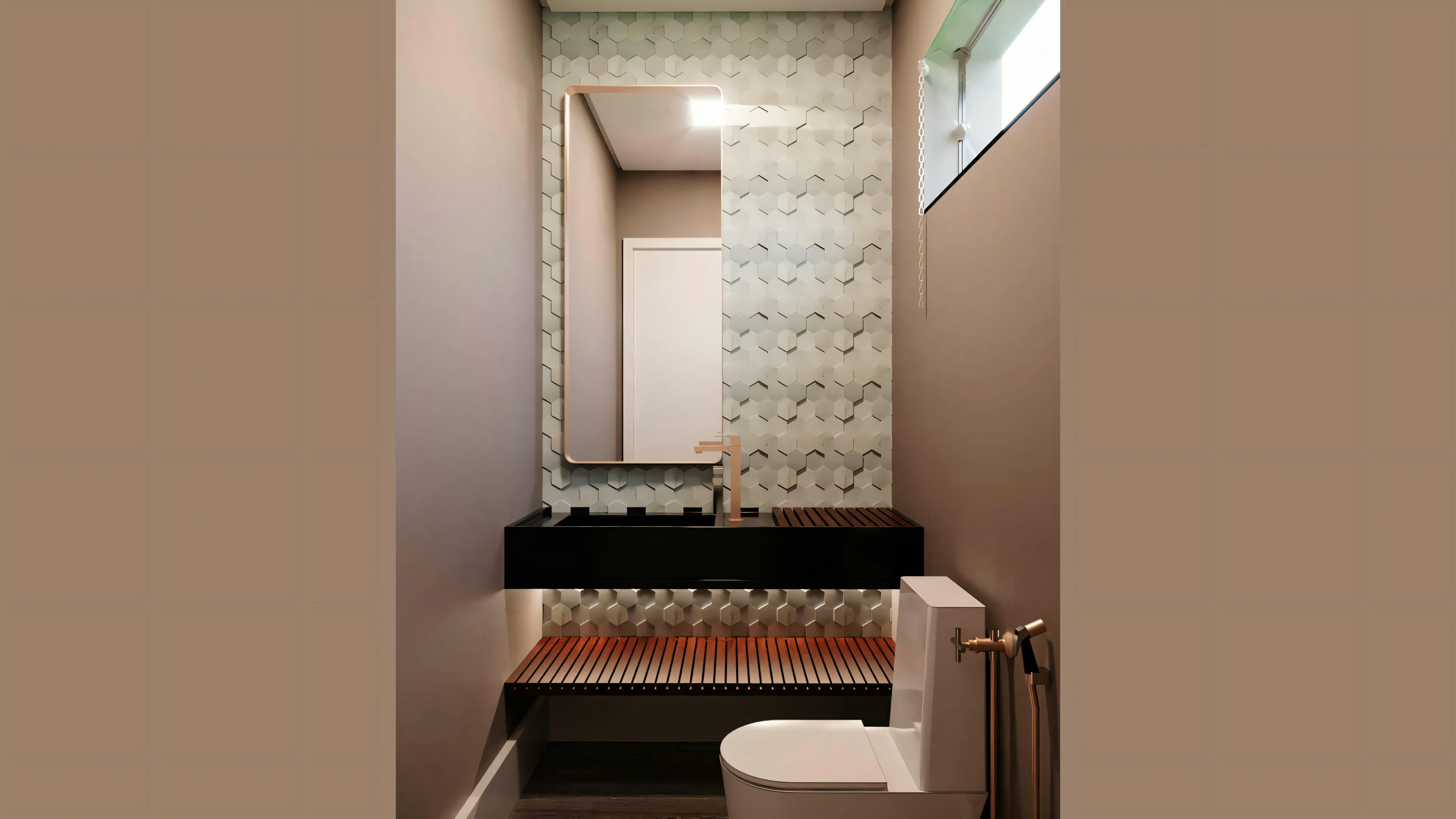 Un baño con paredes beige, lavabo blanco y espejo encima. Hay una zona de ducha con mampara de cristal y azulejos decorativos.