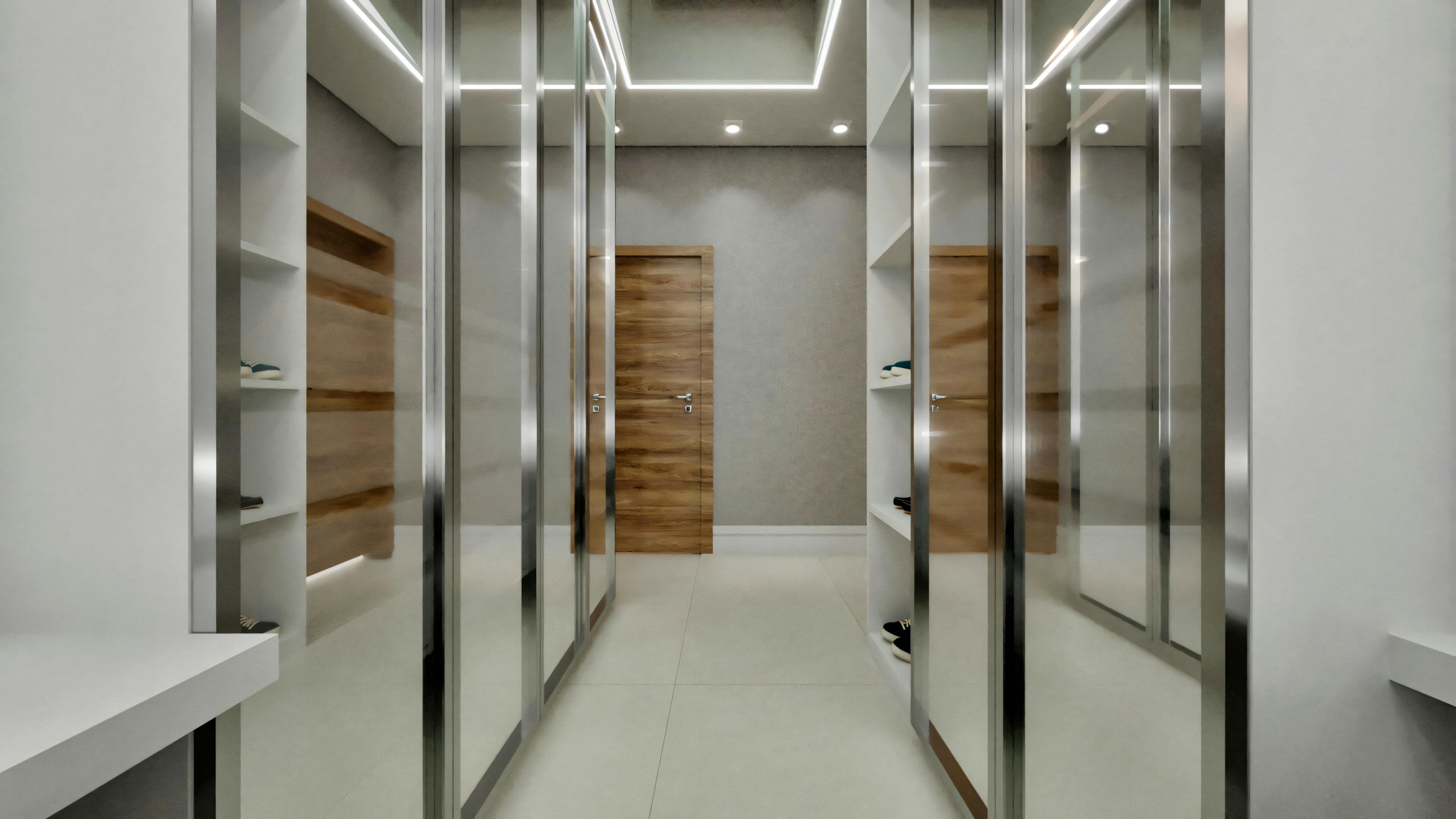 Vista del pasillo del vestidor con armarios con espejo enmarcados en metal, estantes abiertos con hornacinas de madera, iluminación empotrada en el techo, suelo claro y puerta de madera al fondo, en suite de casa neoclásica.