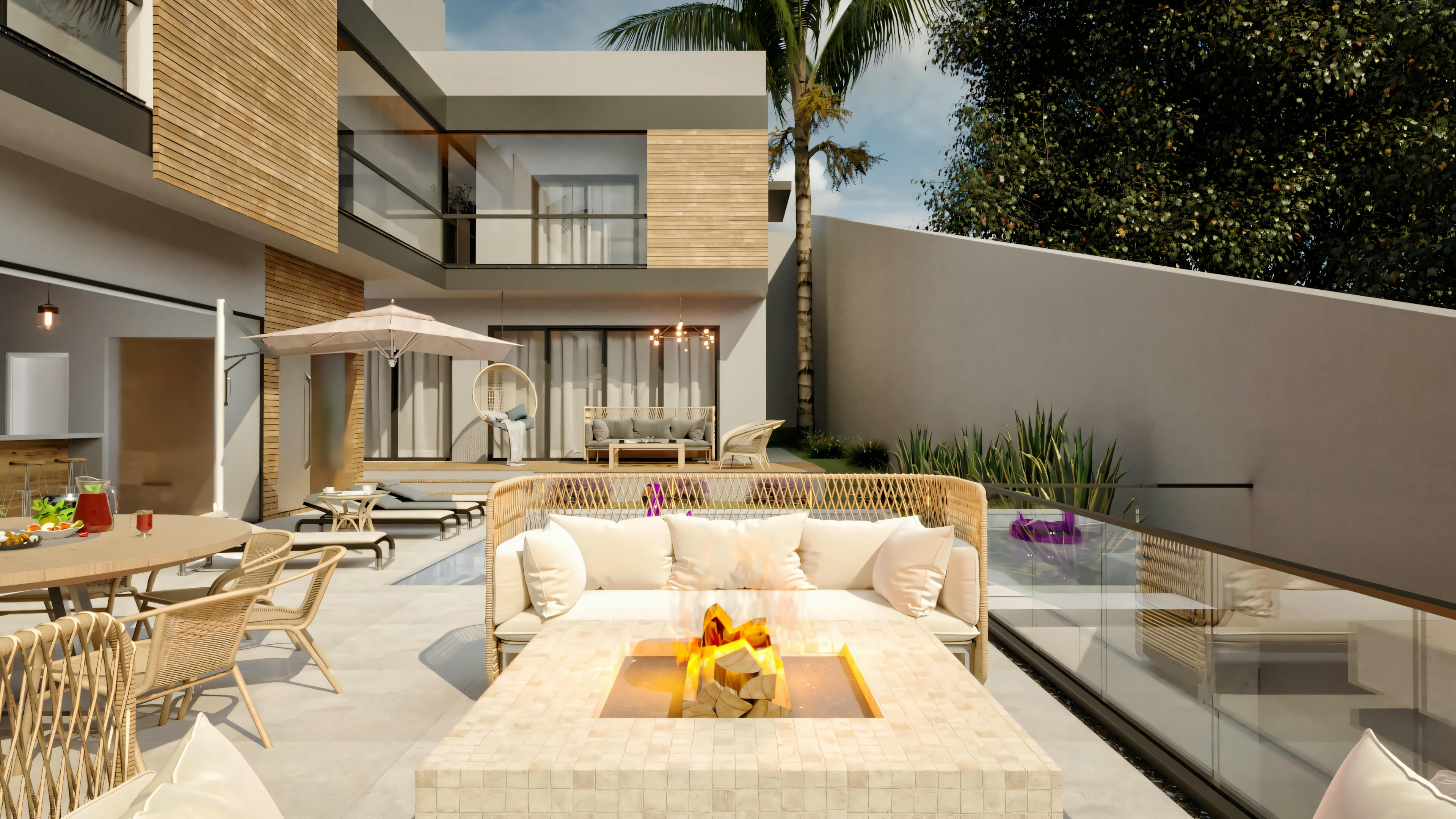 Amplia área de ocio de casa de planta baja moderna con 4 suites, piscina con vidrio, hoguera, sofás y área de comedor exterior, integrada a la fachada con detalles en madera.
