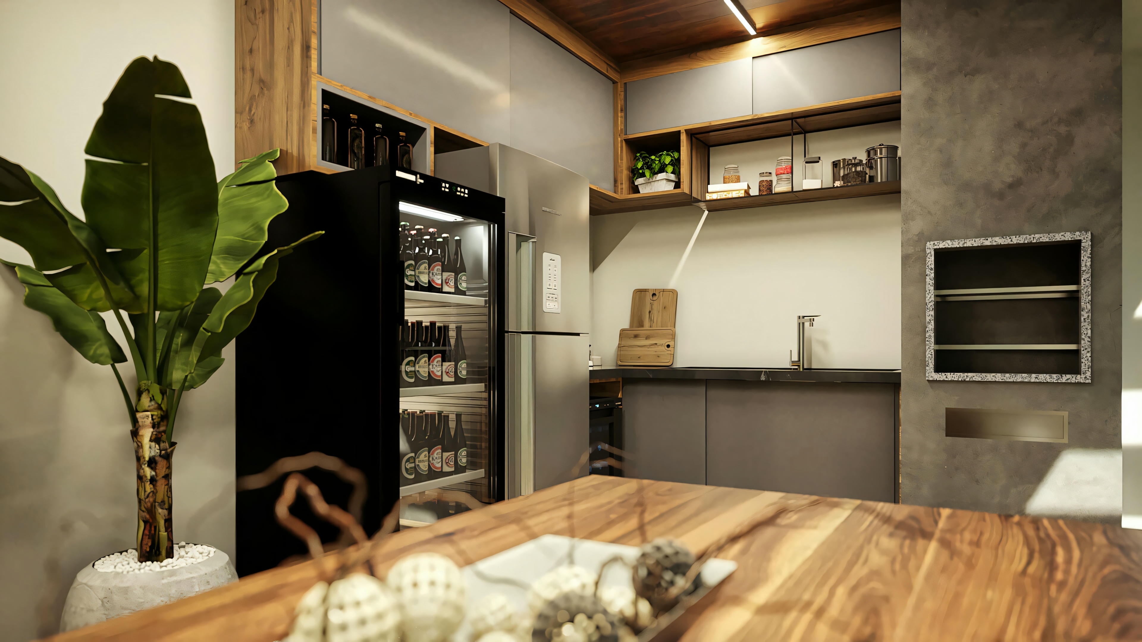Cocina moderna con electrodomésticos de acero inoxidable, planta grande y zona de comedor.