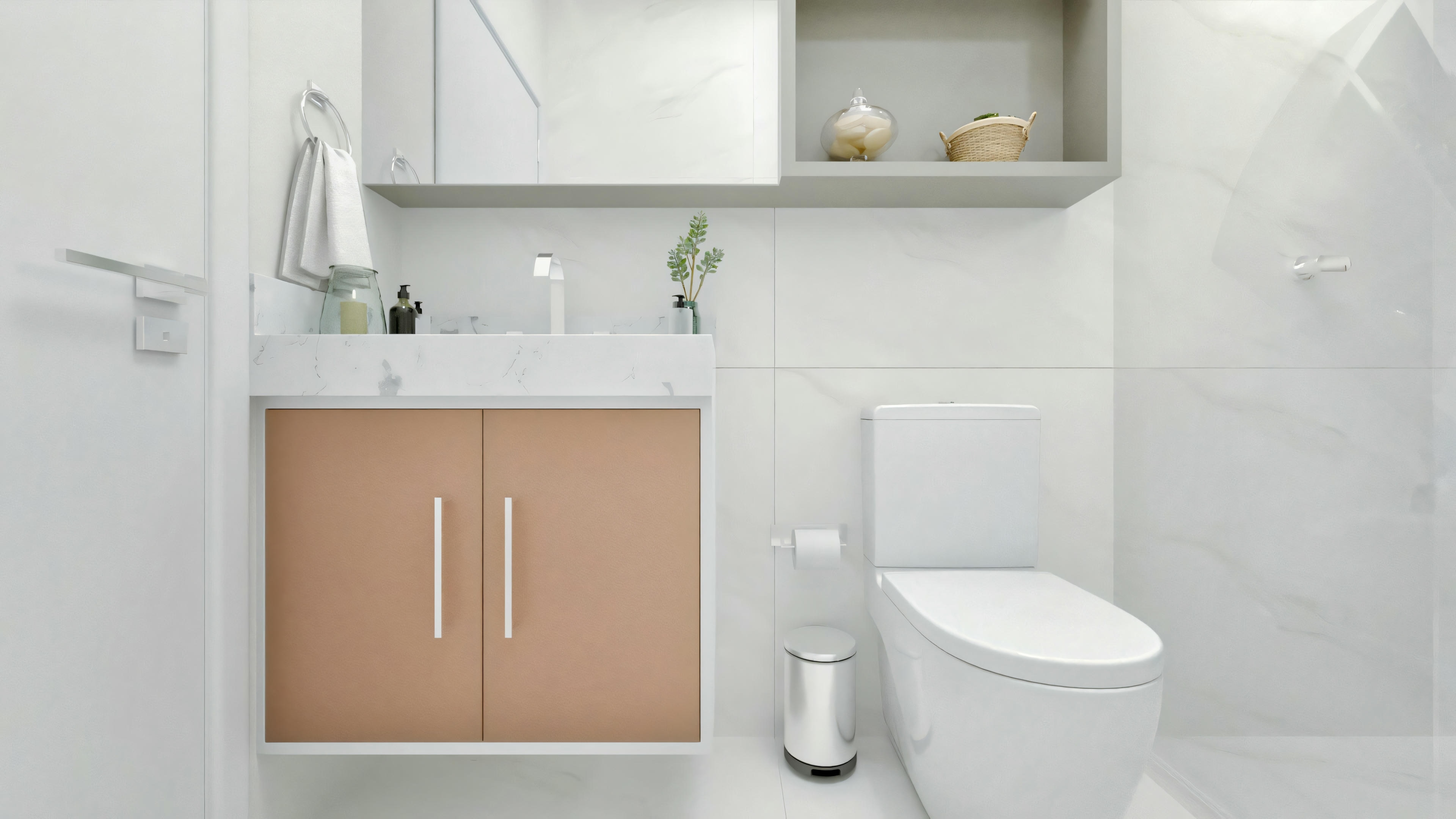 A modern bathroom with a white sink, a mirror, and a decorative plant on the side.