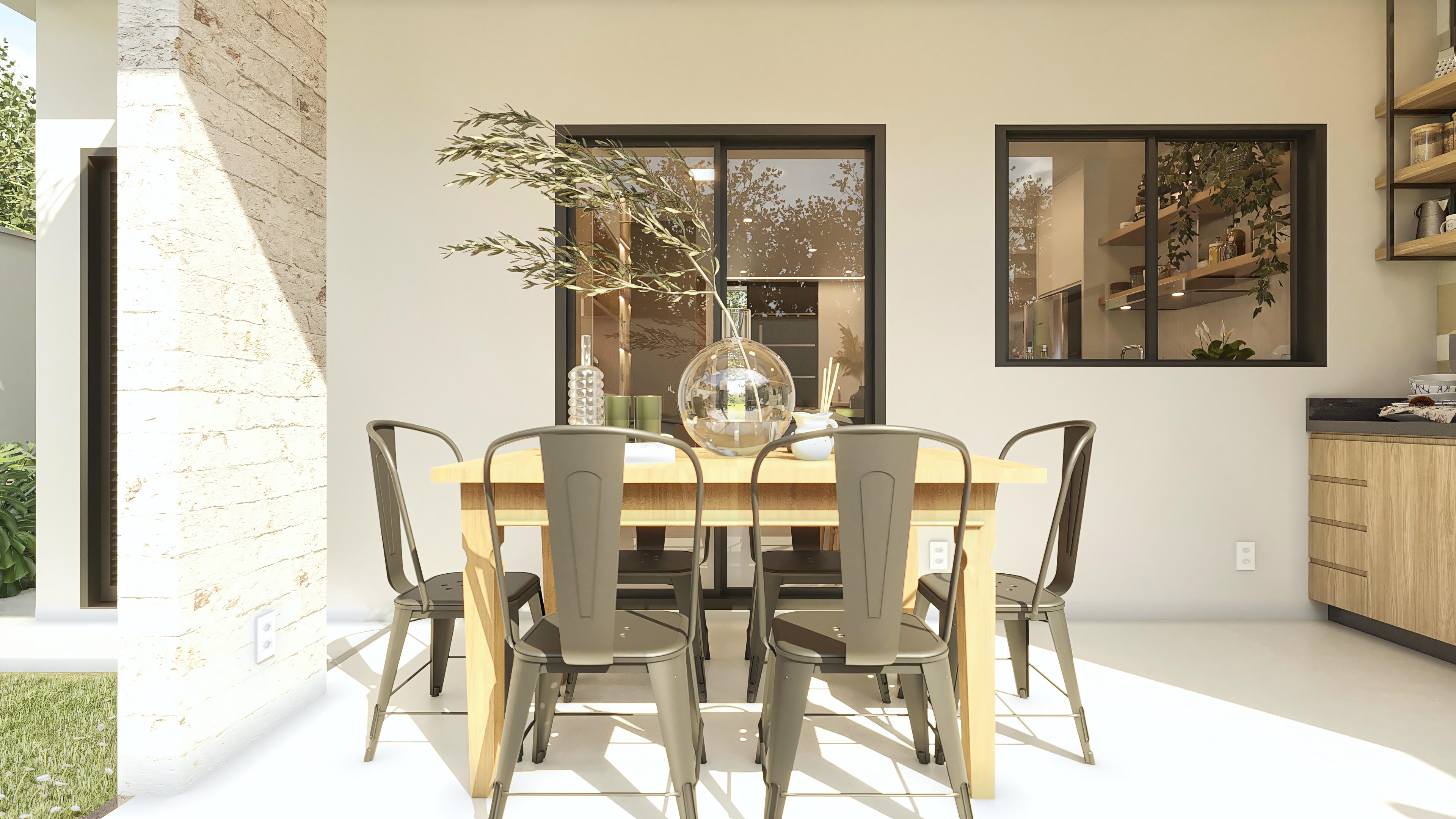 Vista interna del área gourmet con mesa de madera, sillas metálicas grises, jarrones decorativos y vista a la piscina.