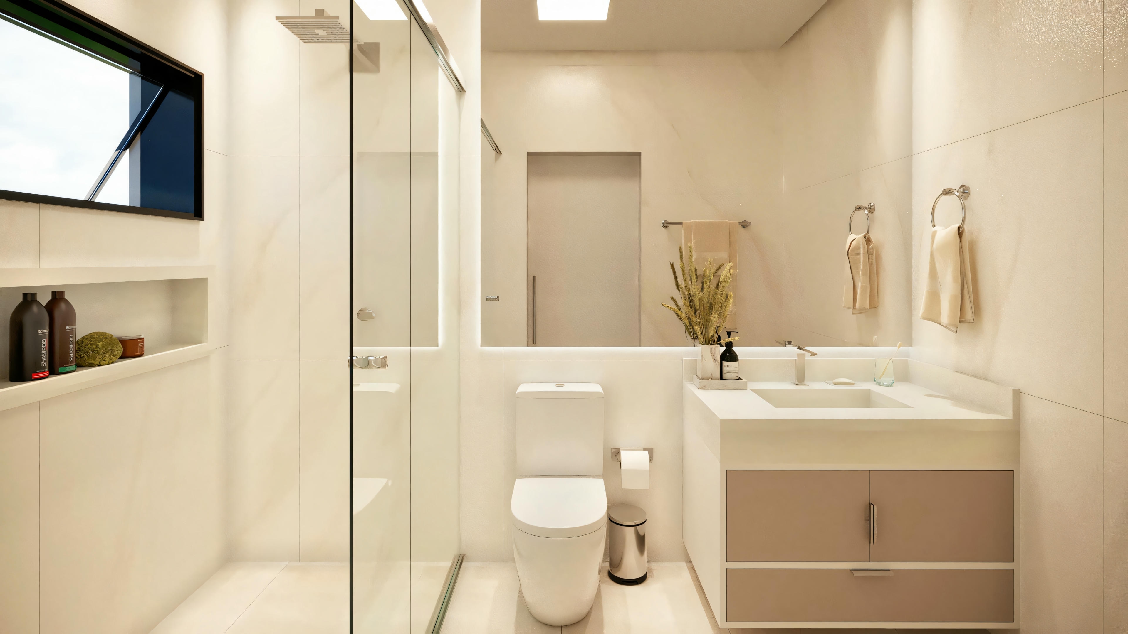 Baño moderno con inodoro blanco, lavabo con encimera beige y espejo grande.