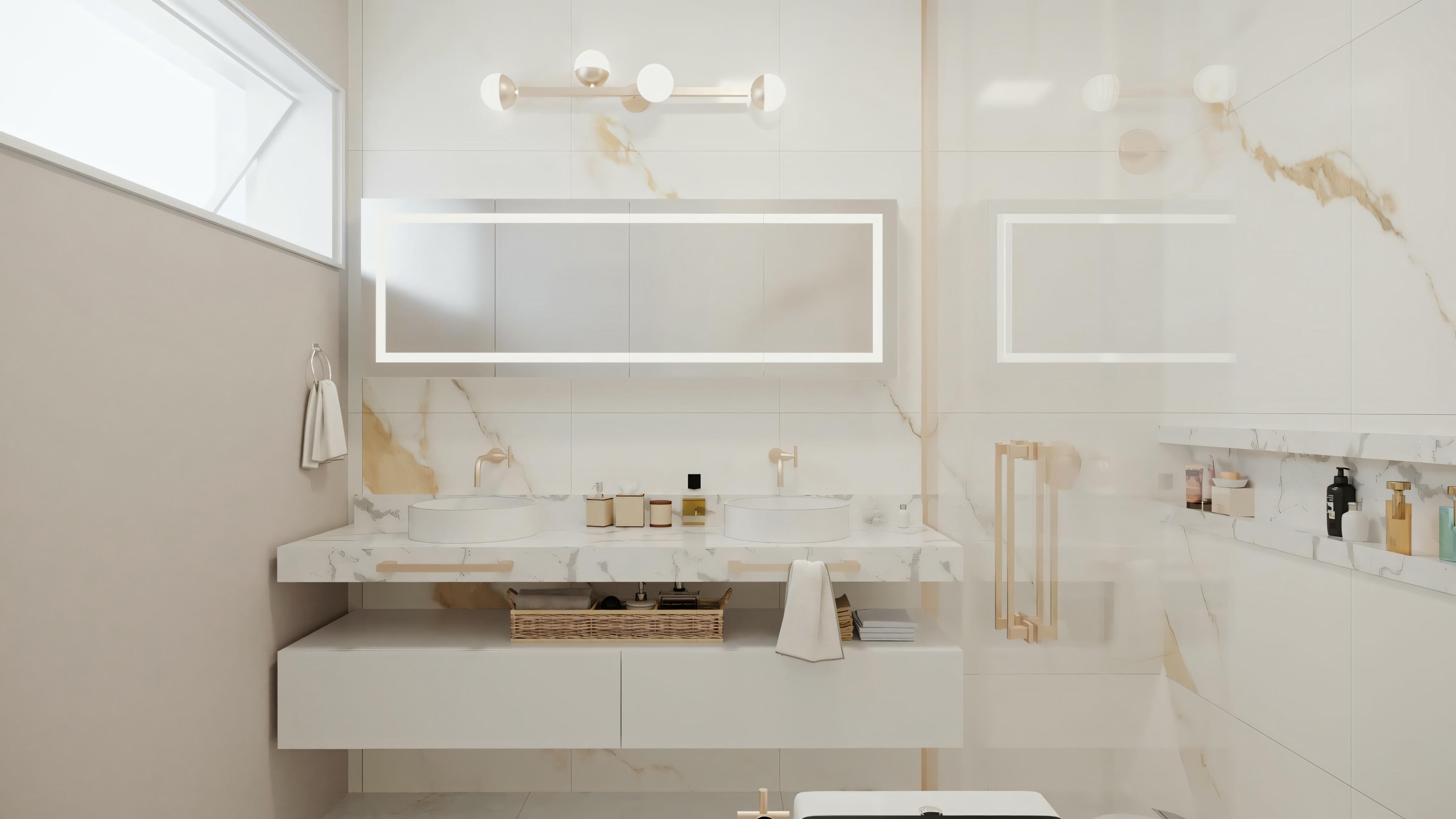 Detalhe da bancada dupla com cubas de sobrepor em banheiro de suíte master, projeto de casa de luxo com metais rose gold e espelho iluminado.